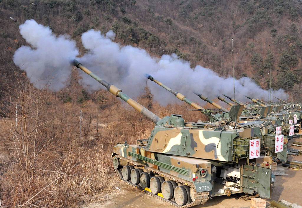 South Korean Army K9 self-propelled howitzers fire rounds