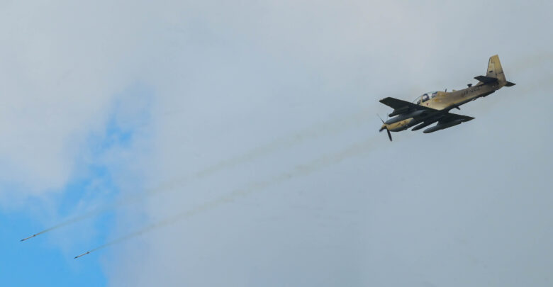 Nigerian Air Force A-29 Super Tucano aircraft pilot launches a Hydra 70 rocket