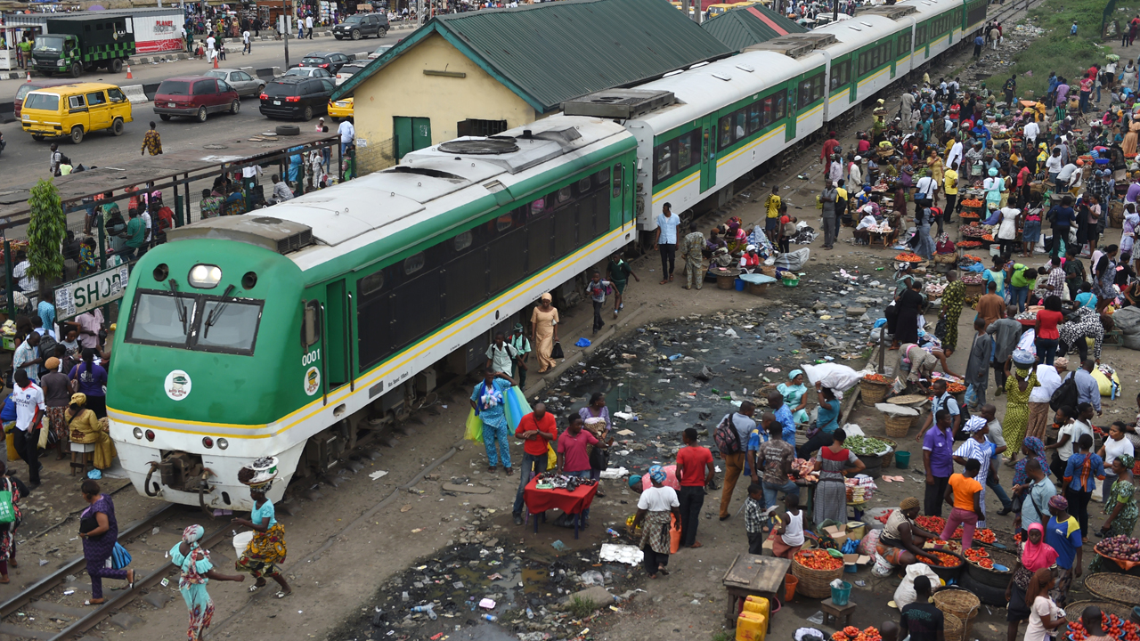 Passengers board a train in Nigeria