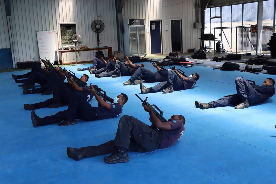 Chinese officers train the Royal Solomon Islands Police Force in unarmed combat skills
