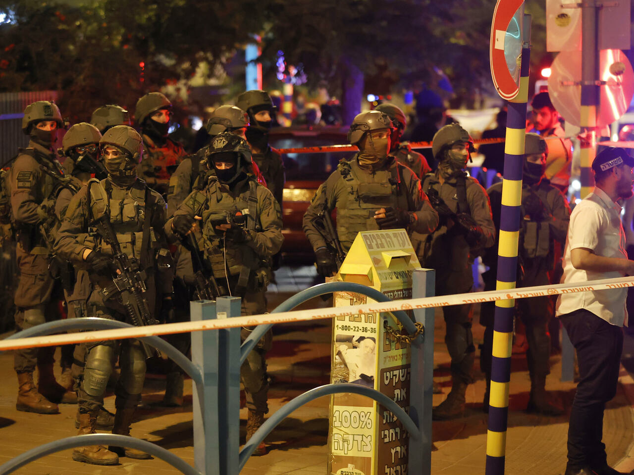 Israeli security forces are pictured at the scene of an attack