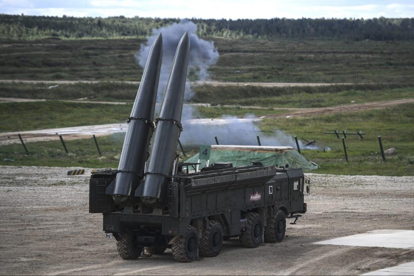 Russian officials give a presentation of the Iskander M missile