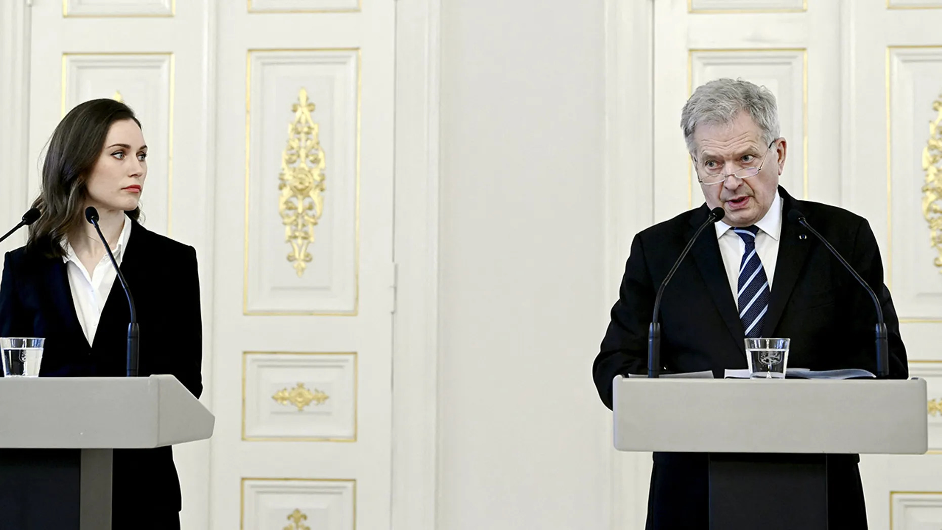 Finland's President Sauli Niinistö and Finland's Prime Minister Sanna Marin address a press conference