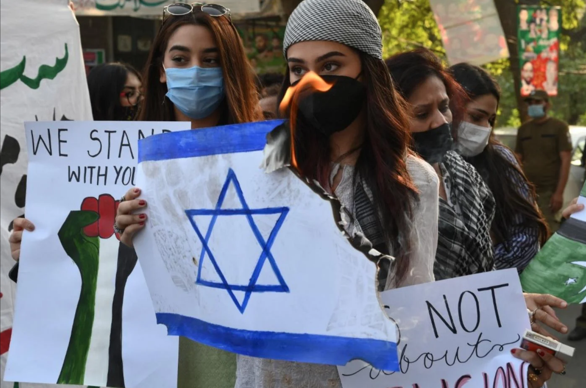 Activists protest Israeli air strikes in Gaza in Lahore, Pakistan