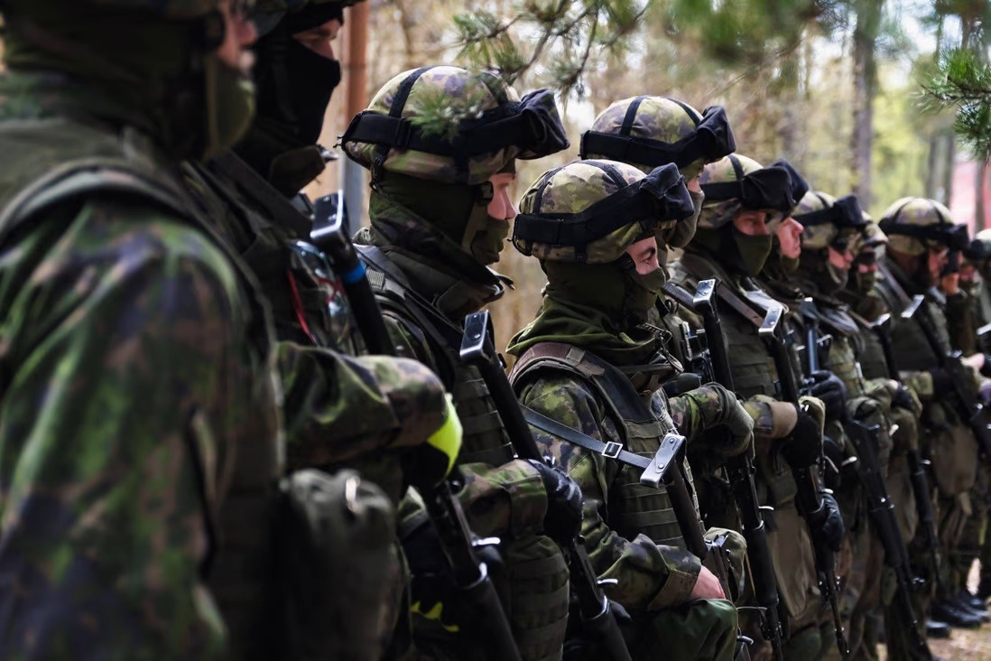 Members of the MPK, the National Defence Training Association of Finland, attend a training at a military base