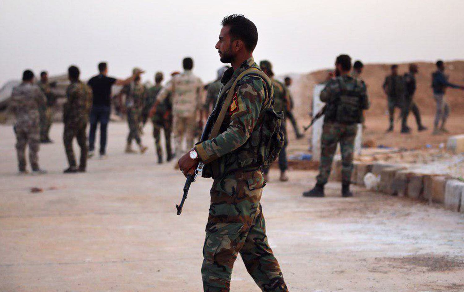 Syrian government forces at Tabqa air base in Syria's Raqqa region