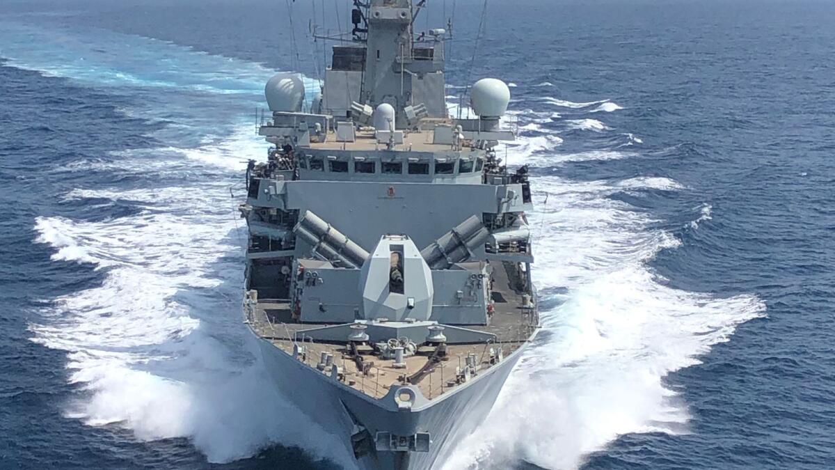 HMS Montrose accompanying merchant vessels in the Gulf
