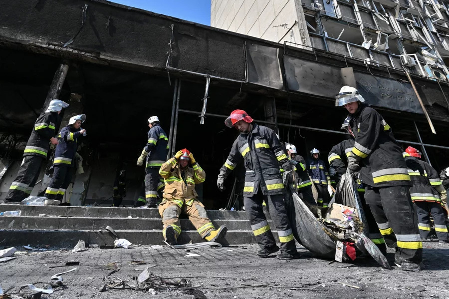 Firefighters remove rubble following a Russian airstrike in the central city of Vinnytsia