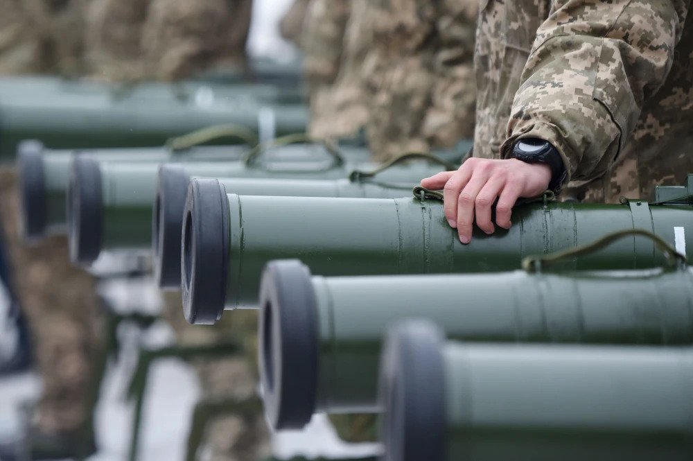Ukrainian servicemen taking part in the armed conflict with Russia-backed separatists in Donetsk region of the country attend the handover ceremony of military heavy weapons and equipment in Kyiv