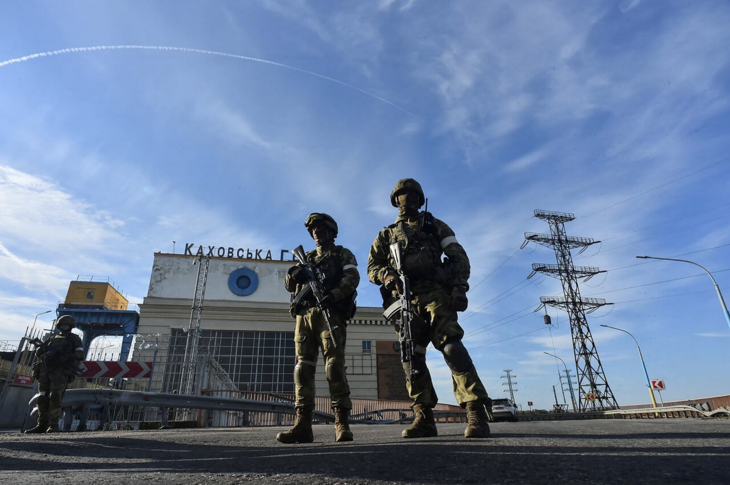 Russian servicemen patrolling at the Kakhovka Hydroelectric Power Plant, Kherson