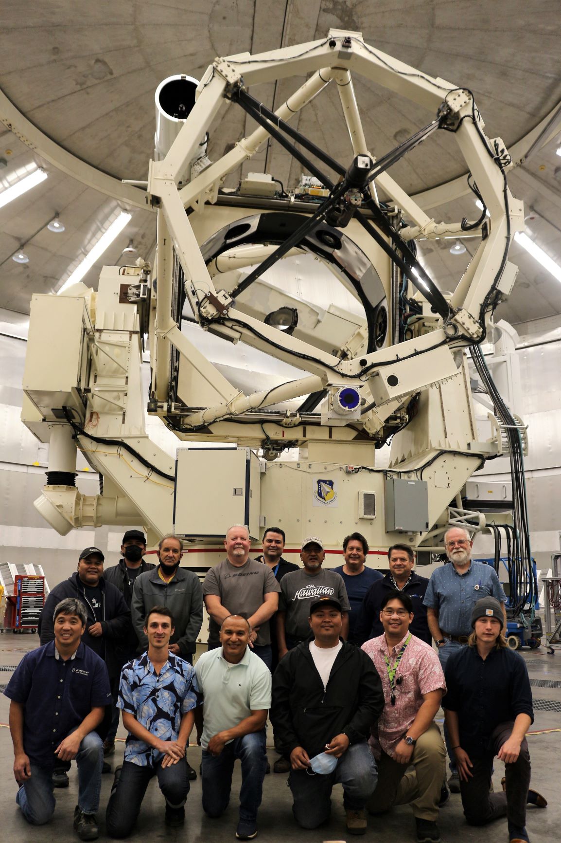 Boeing team in front of Advanced Electro-Optical System (AEOS) telescope