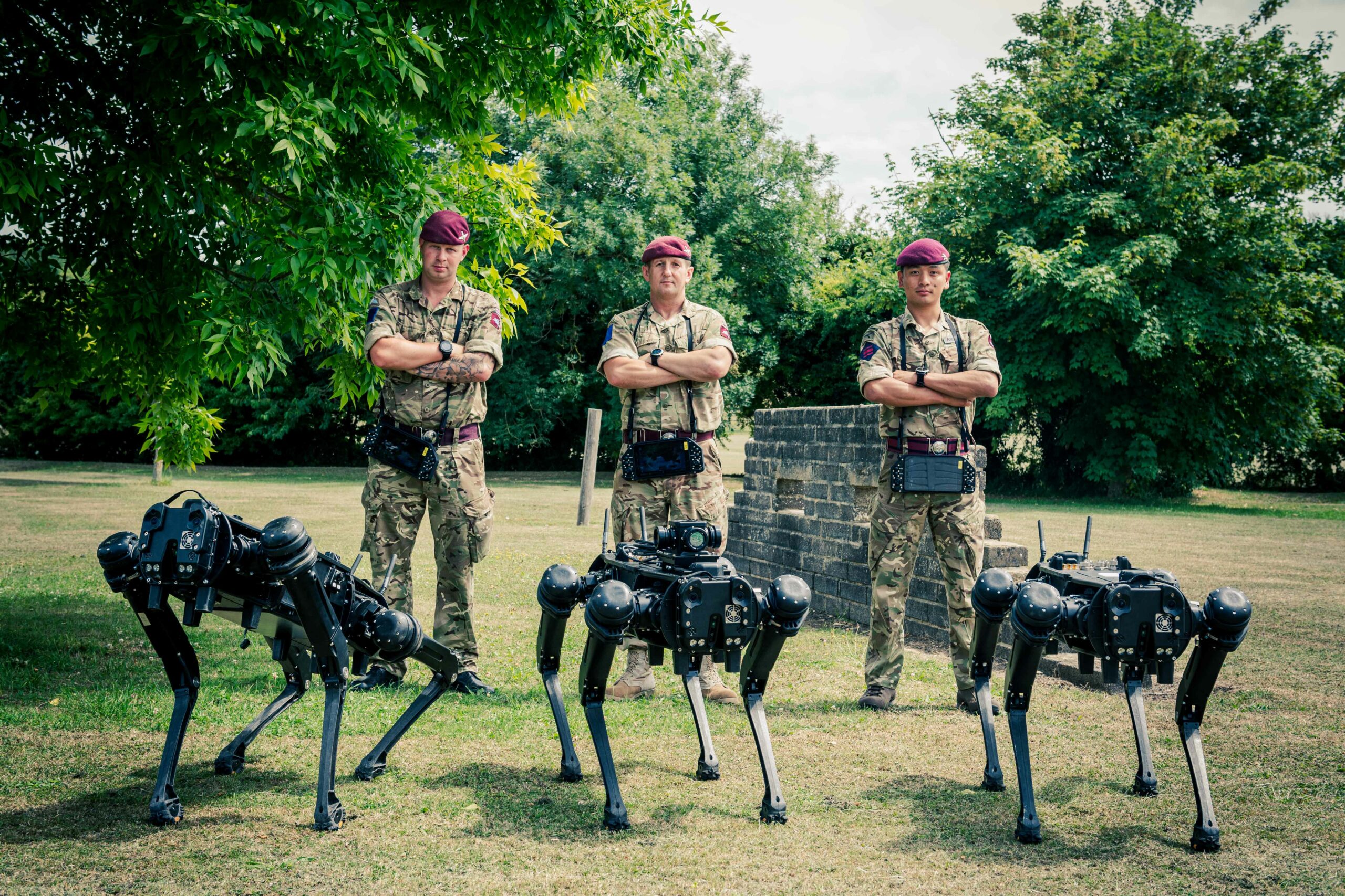 British Army soldiers with V60 quadrupeds.
