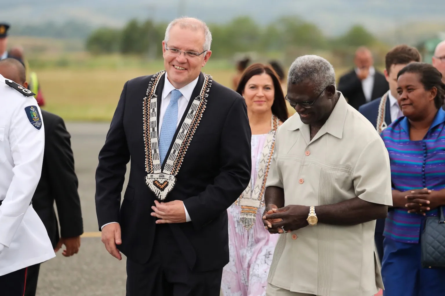 Former Australian Prime Minister Scott Morrison is greeted by Solomon Islands' PM Manasseh Sogavare during a trip to Honiara
