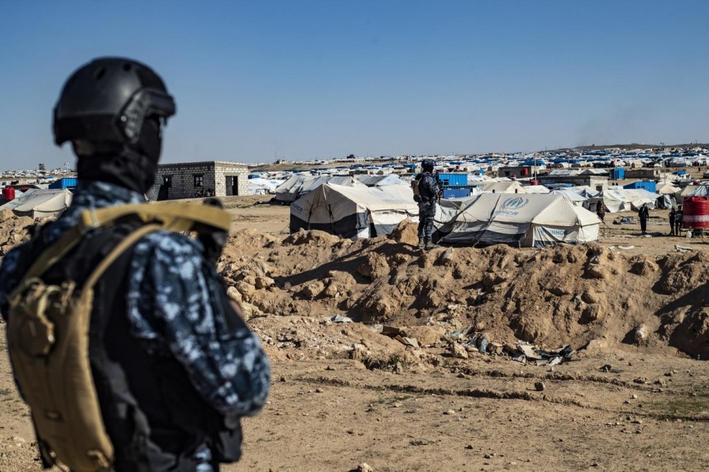 Syrian Democratic Forces keep watch in the vicinity of al-Hol camp.