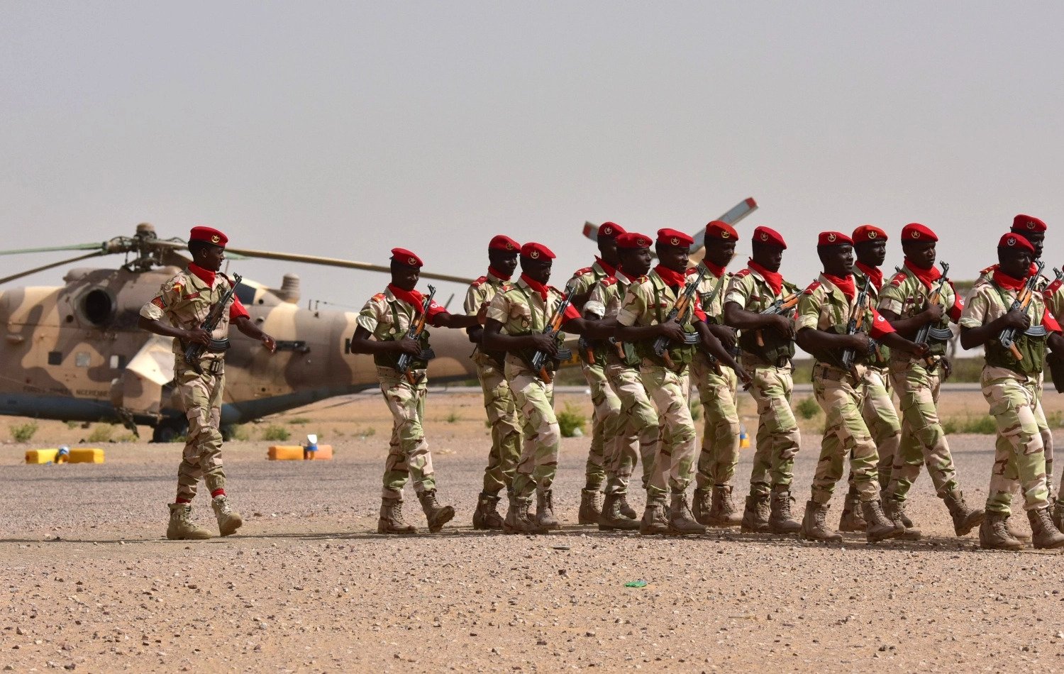 Soldiers from Niger's National Guard march on the tarmac in Diffa, southeastern Niger