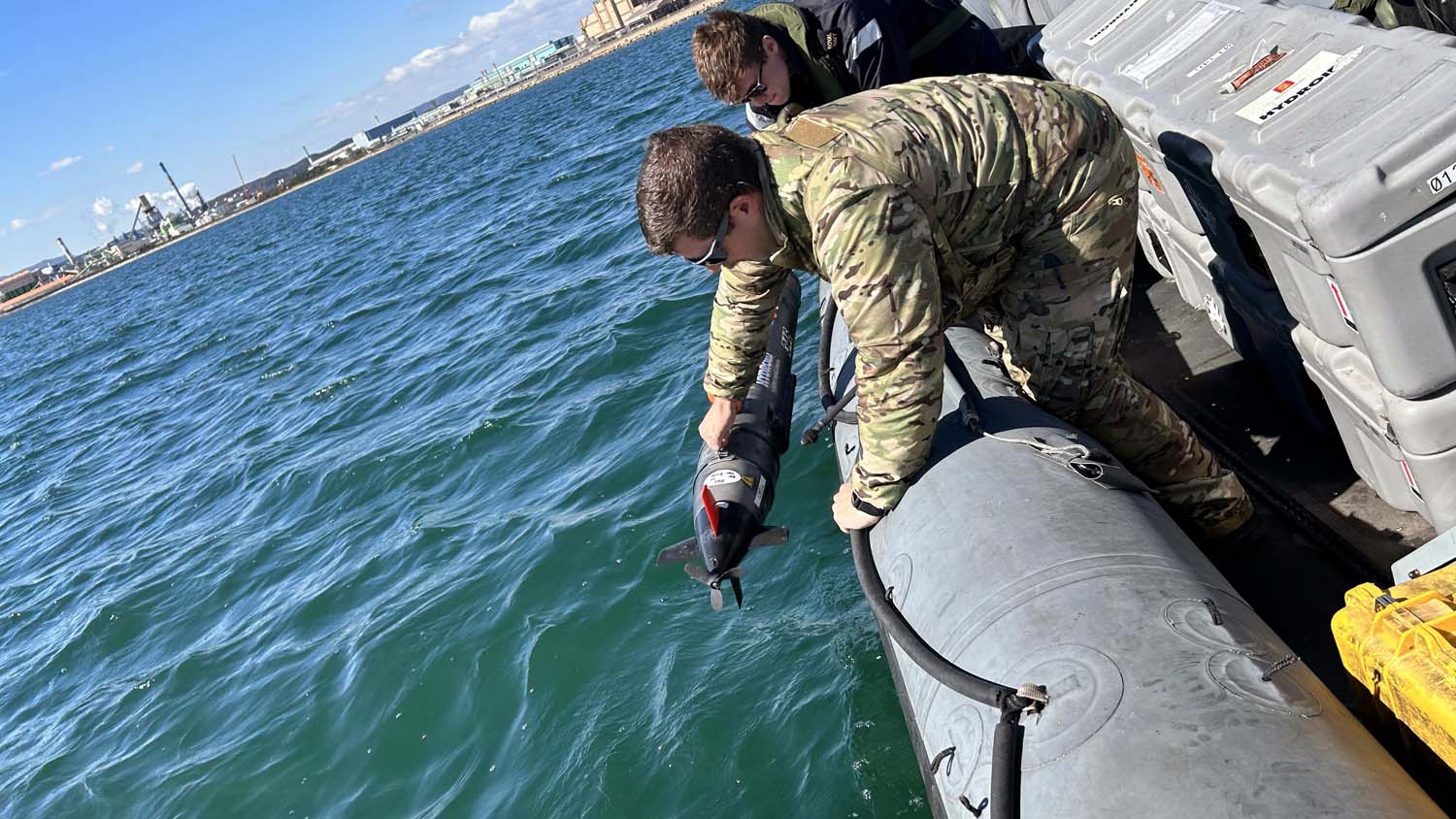 A REMUS UUV is launched from one of HMS Tamar's boats