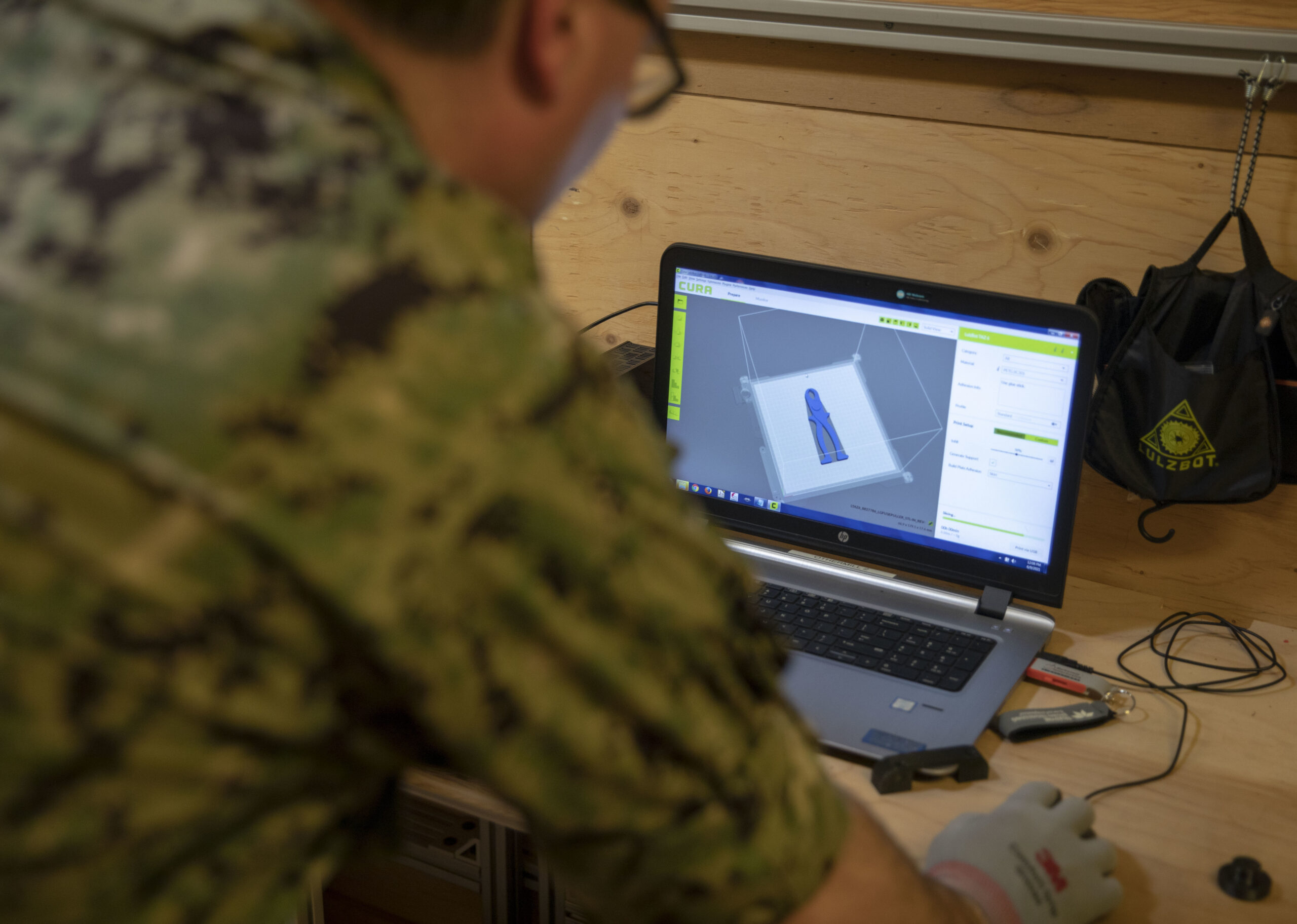 Additive manufacturing analyst uses 3D-printing software.