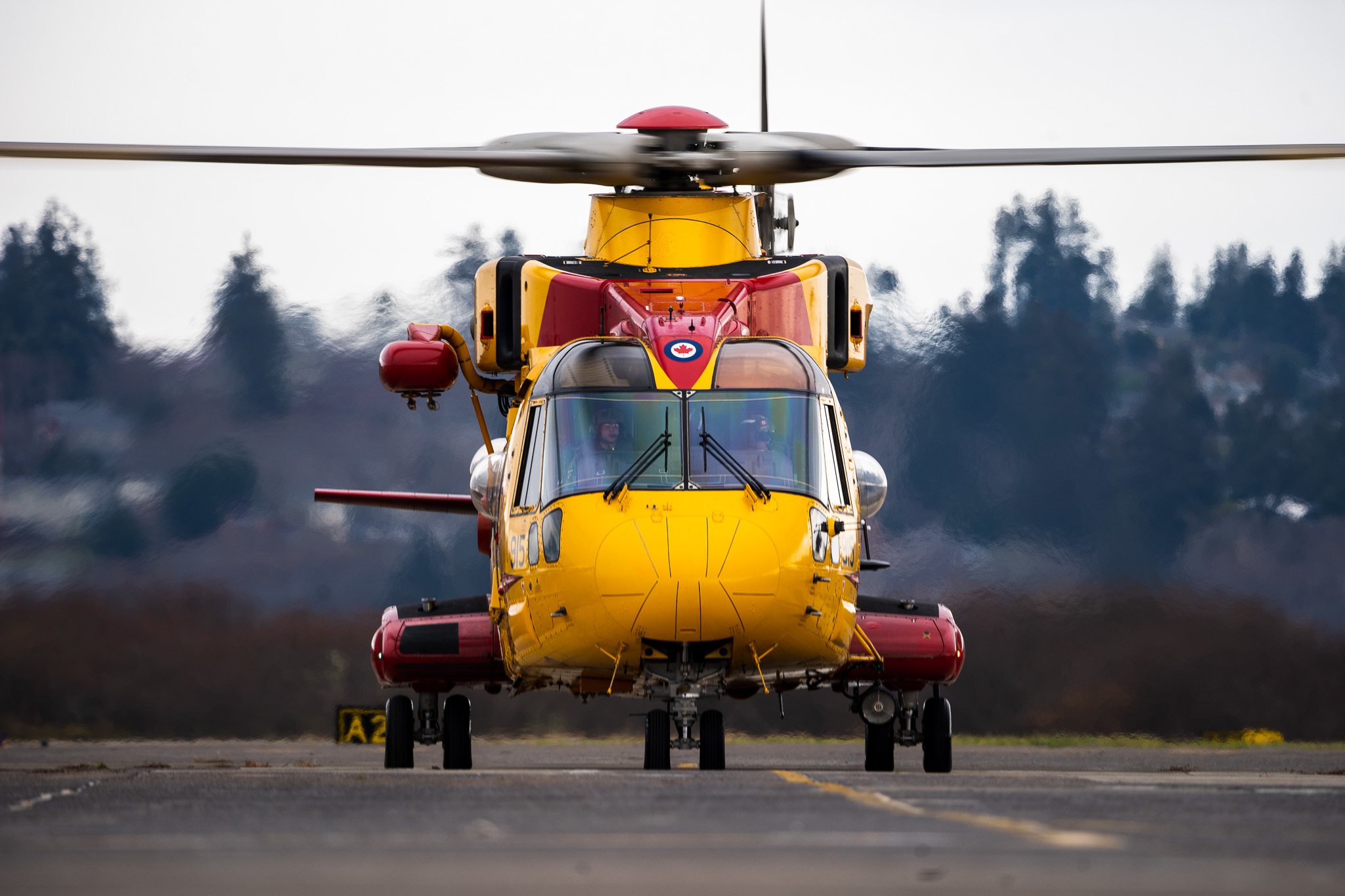 A Royal Canadian Air Force CH-149 Cormorant helicopter aircrew from 442 Transport and rescue squadron from 19 Wing Comox in British Columbia, Canada, land at Air Station Astoria in Warrenton, Oregon, Dec. 7, 2022. During the aircrew’s visit they were provided a tour of the air station and participated in joint search and rescue training. (U.S. Coast Guard photo by Petty Officer 1st Class Travis Magee)