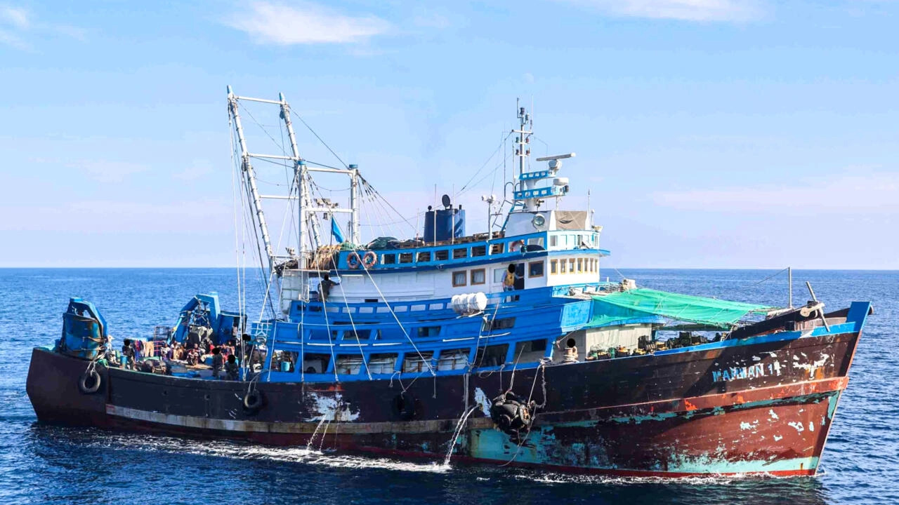 A fishing trawler intercepted by the US Navy was reportedly carrying 'significant' amounts of ammunition bound for Yemen, pictured in this US handout photograph