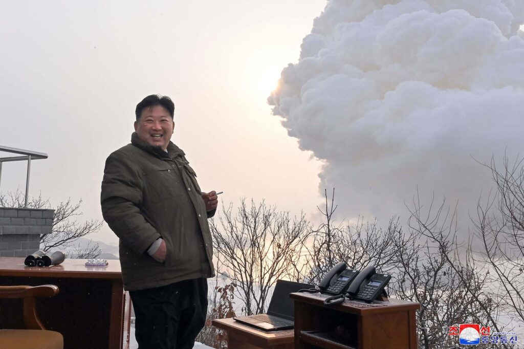 North Korea's leader Kim Jong Un directs a ground ejection test - a high-power solid fuel engine test