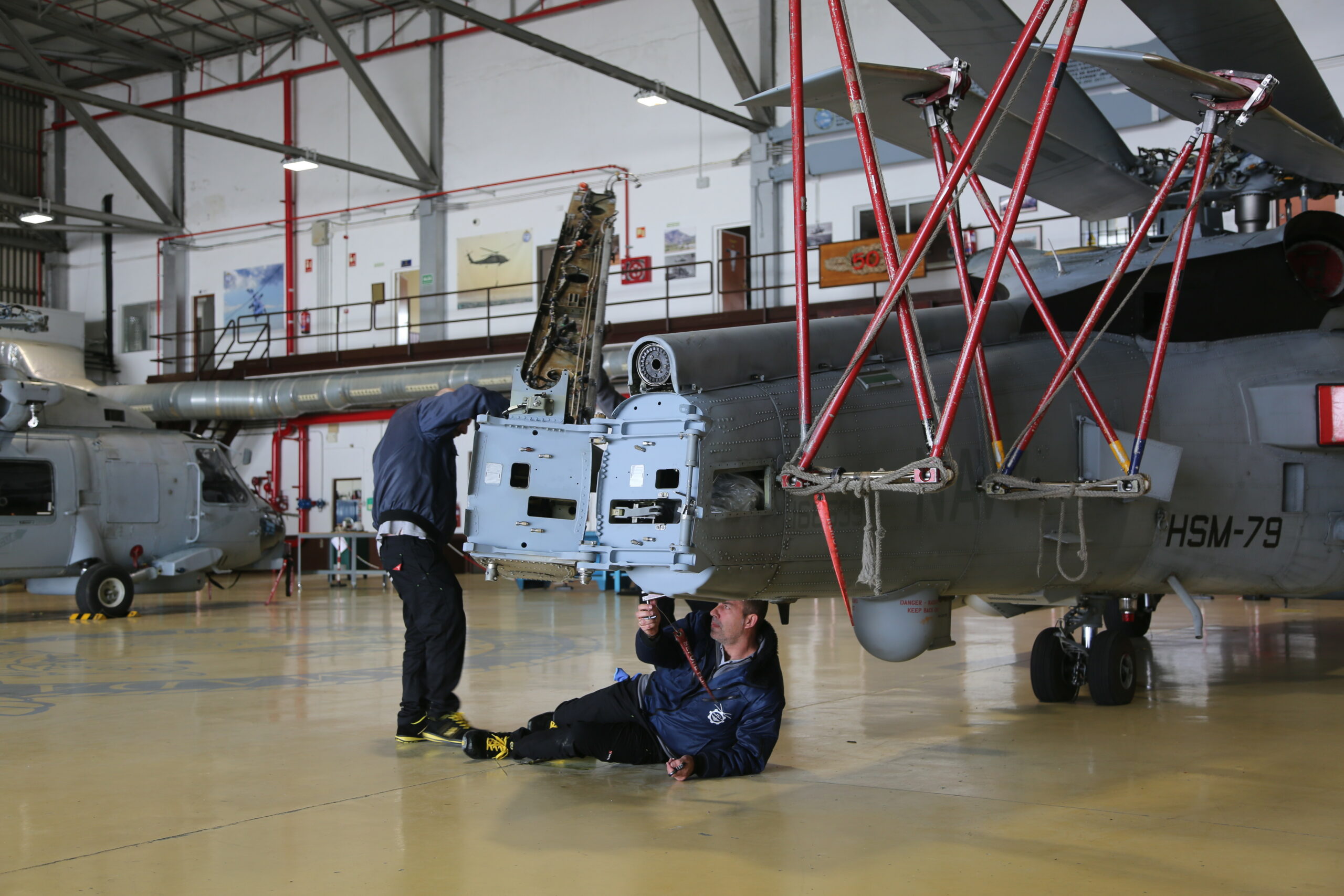 Sailors assigned to Helicopter Maritime Strike Squadron (HSM) 79 completed an MH-60R tail bushing repair with Spanish aviation specialists at Naval Station Rota, Spain, January 2023. (US Navy photo by LT Katherine Kinnear.)