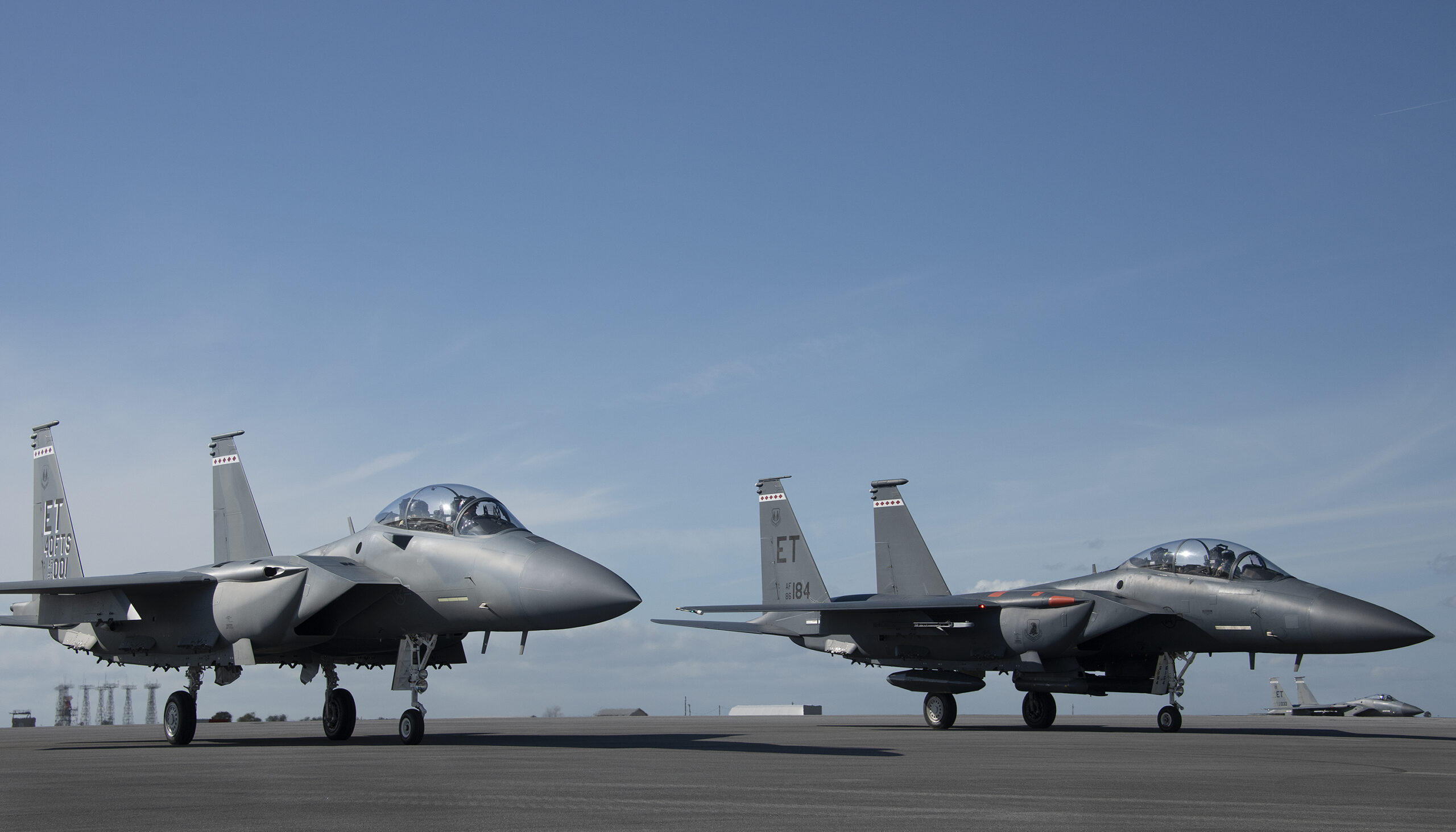 The F-15EX, the Air Force’s newest fighter aircraft, is flanked by an F-15E and F-15C in the distance March 11 at Eglin Air Force Base, Fla. The aircraft will be the first Air Force aircraft to be tested and fielded from beginning to end through combined developmental and operational tests. The 40th Flight Test Squadron and the 85th Test and Evaluation Squadron personnel are responsible for testing the aircraft.