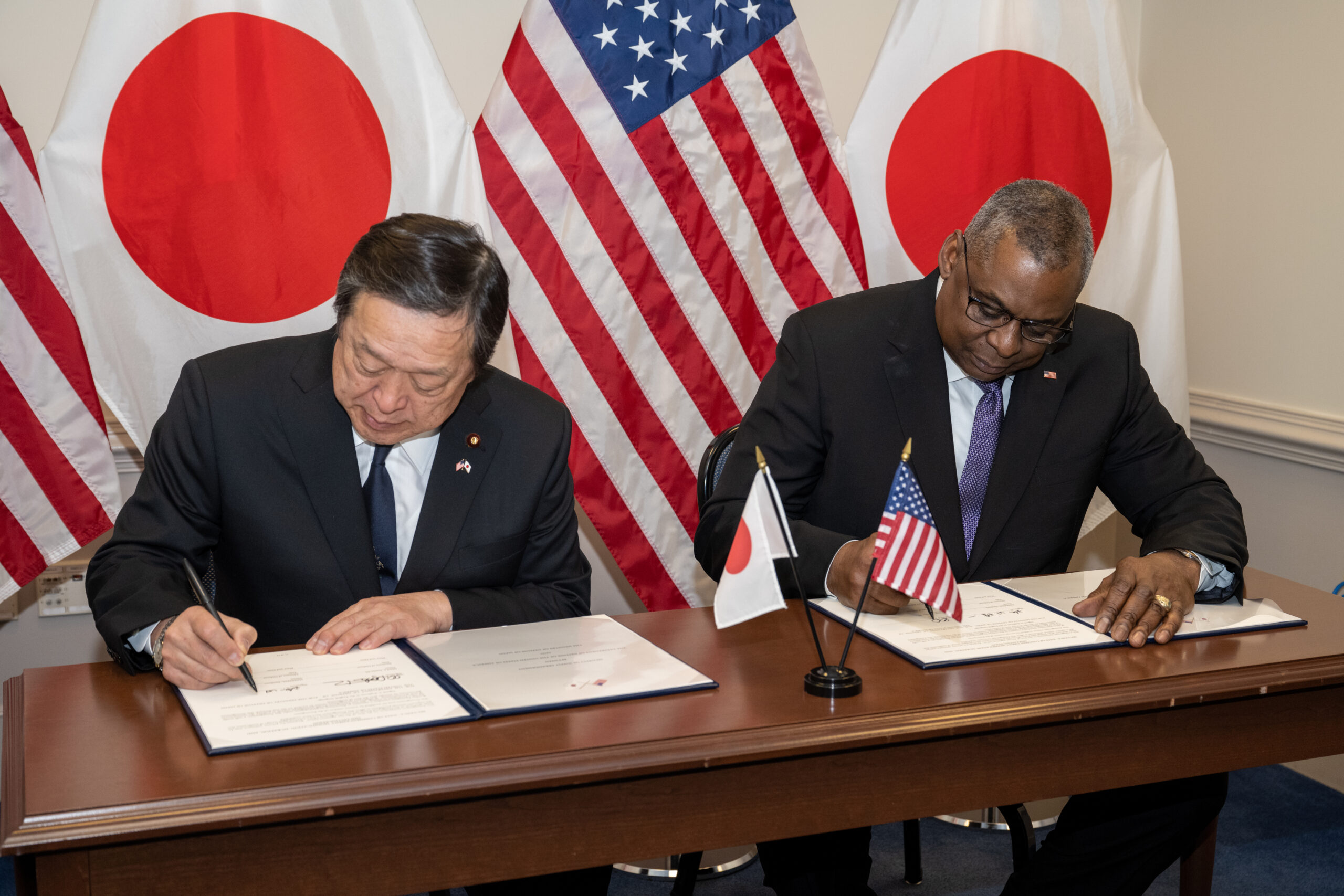 Secretary of Defense Lloyd J. Austin III speaks with Japanese Defense Minister Yasukazu Hamada during a bilateral exchange at the Pentagon Washington, D.C., Jan 12, 2023. (DoD photo by U.S. Air Force Tech. Sgt. Jack Sanders)
