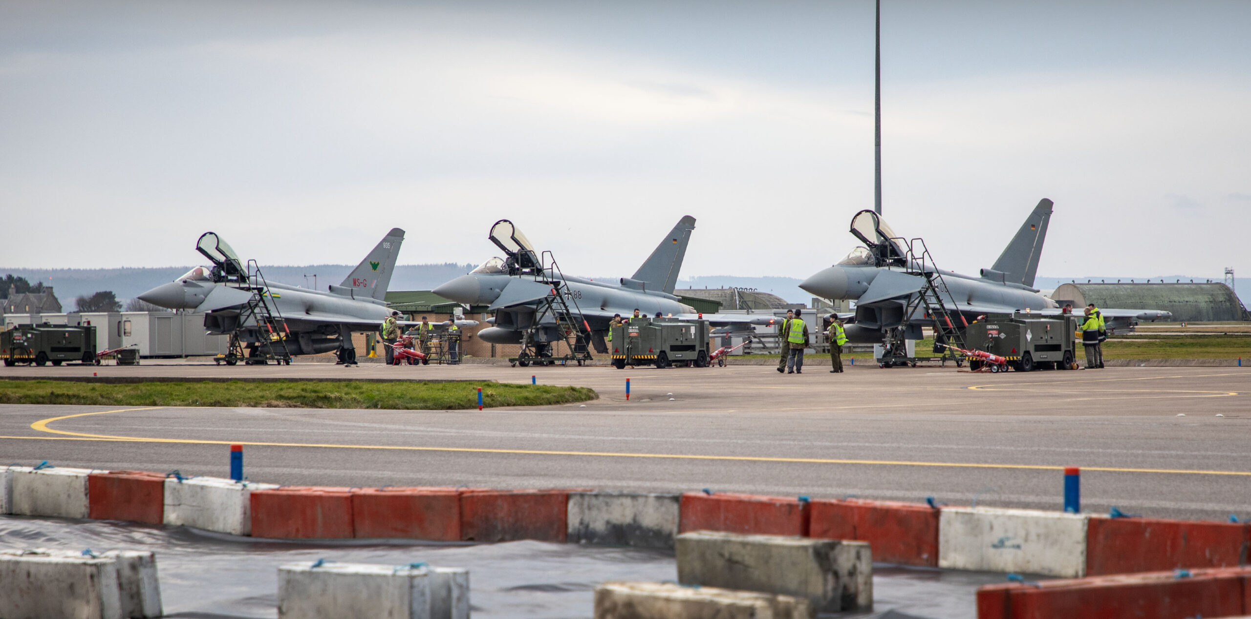 Typhoons and engineers from Taktisches Luftwaffengeschwaver 71 "Richthofen" arrive at RAF Lossiemouth ahead of the their combined deployment to Estonia. They will be conducting in corss-training between the the German Air Force and RAF Typhoon assigned personel and to fly Qucik Reation Alert and Combined Baltic Air Policing training.