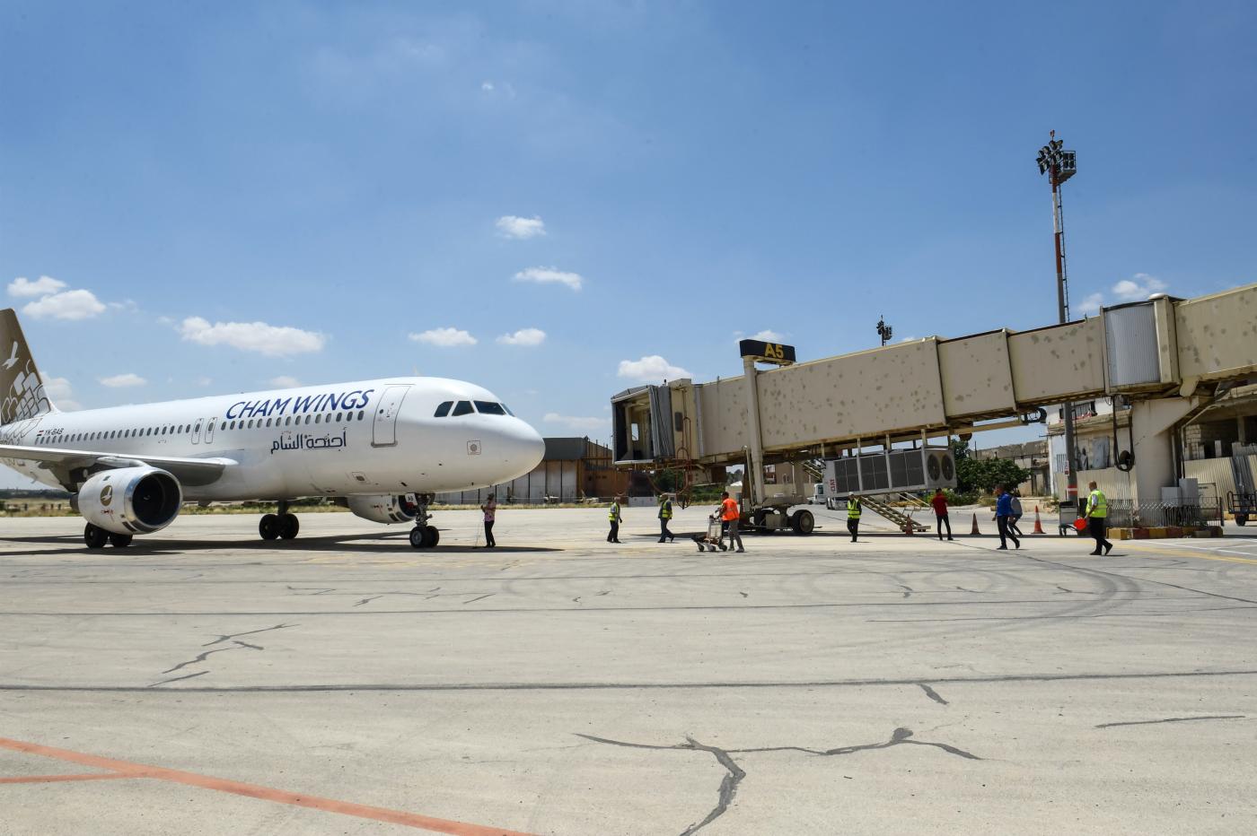 A Cham Wings Airlines Airbus is pictured at Syria's Aleppo airport after flights were diverted from Damascus following an Israeli strike