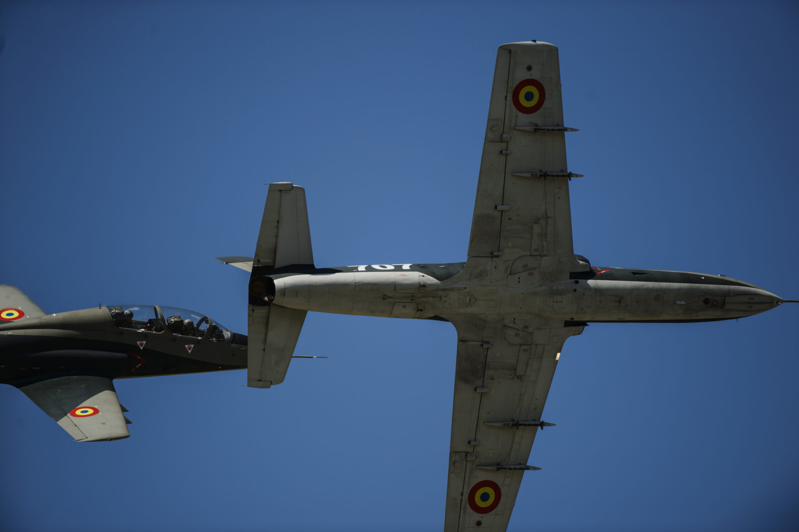 Two Romanian air force IAR-99 Hawks, fly information over head during an air show at Campia Turzii, Romania, July 29, 2017. The air show featured Florida and Louisiana Air National Guard F-15 Eagles, Romanian Mig-21 jet aircraft, IAR 330 helicopters, F-16 Fighting Falcons, tanks, and Humvee's. (U.S. Air Force photo by Staff Sgt. Jonathan Snyder)