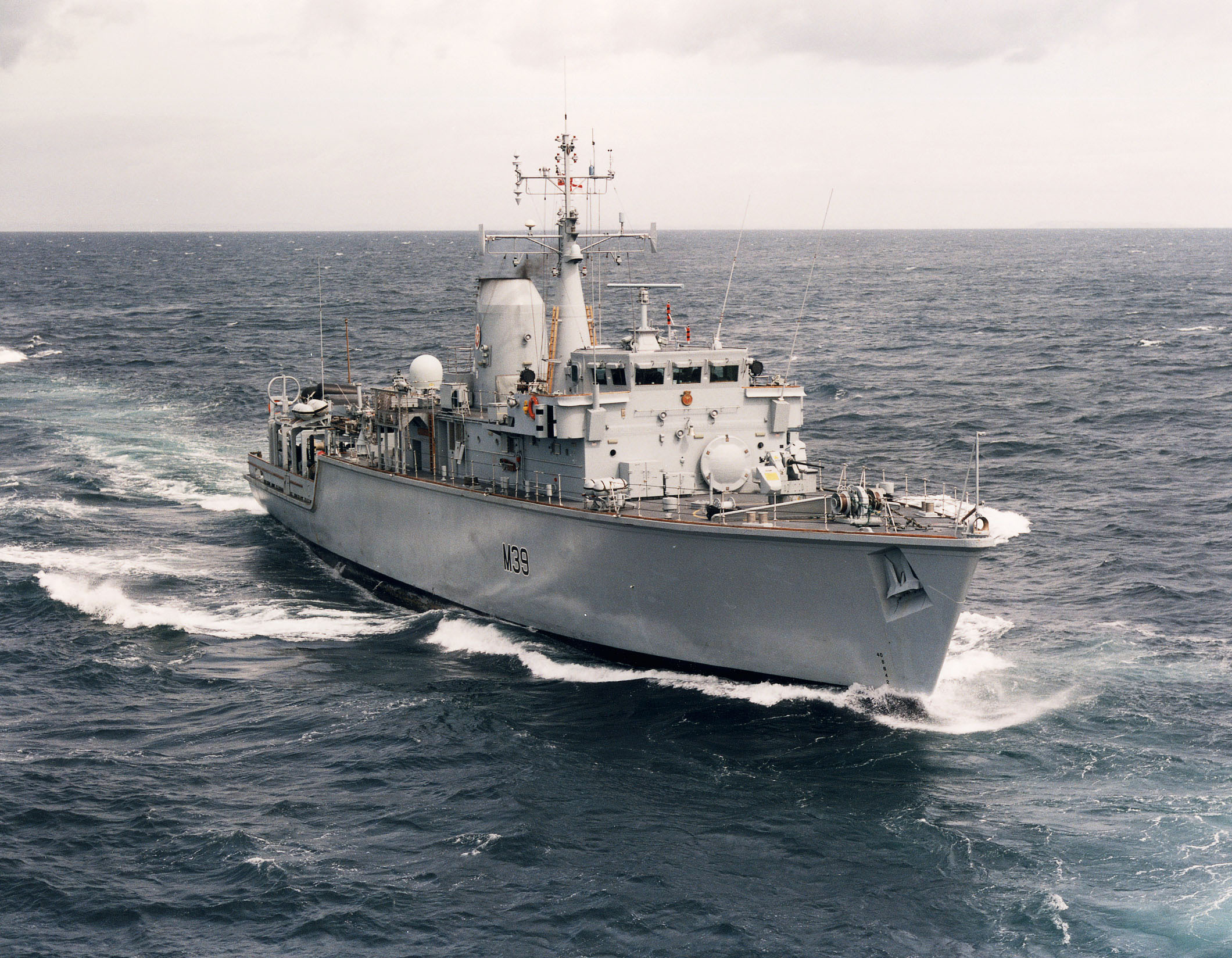 HMS Hurworth operating in the English Channel.The Hunt Class are the largest warships ever constructed out of Glass Reinforced Plastic. Although orginally built as dual purpose Minesweepers and Minehunters, the class are currently configured to function only in the Minehunter role. As Minehunters they 'hunt' for mines with a high definition sonar and then destroy them using explosives placed either by the Mine Clearance Divers or by the Sea Fox Mine Disposal System . In addition they are equiped with: a single 30mm gun, two Miniguns and three General Purpose Machine Guns (GPMGs). This equipment fit enables the Hunt class to function in a Secondary Role as very potent patrol Craft.