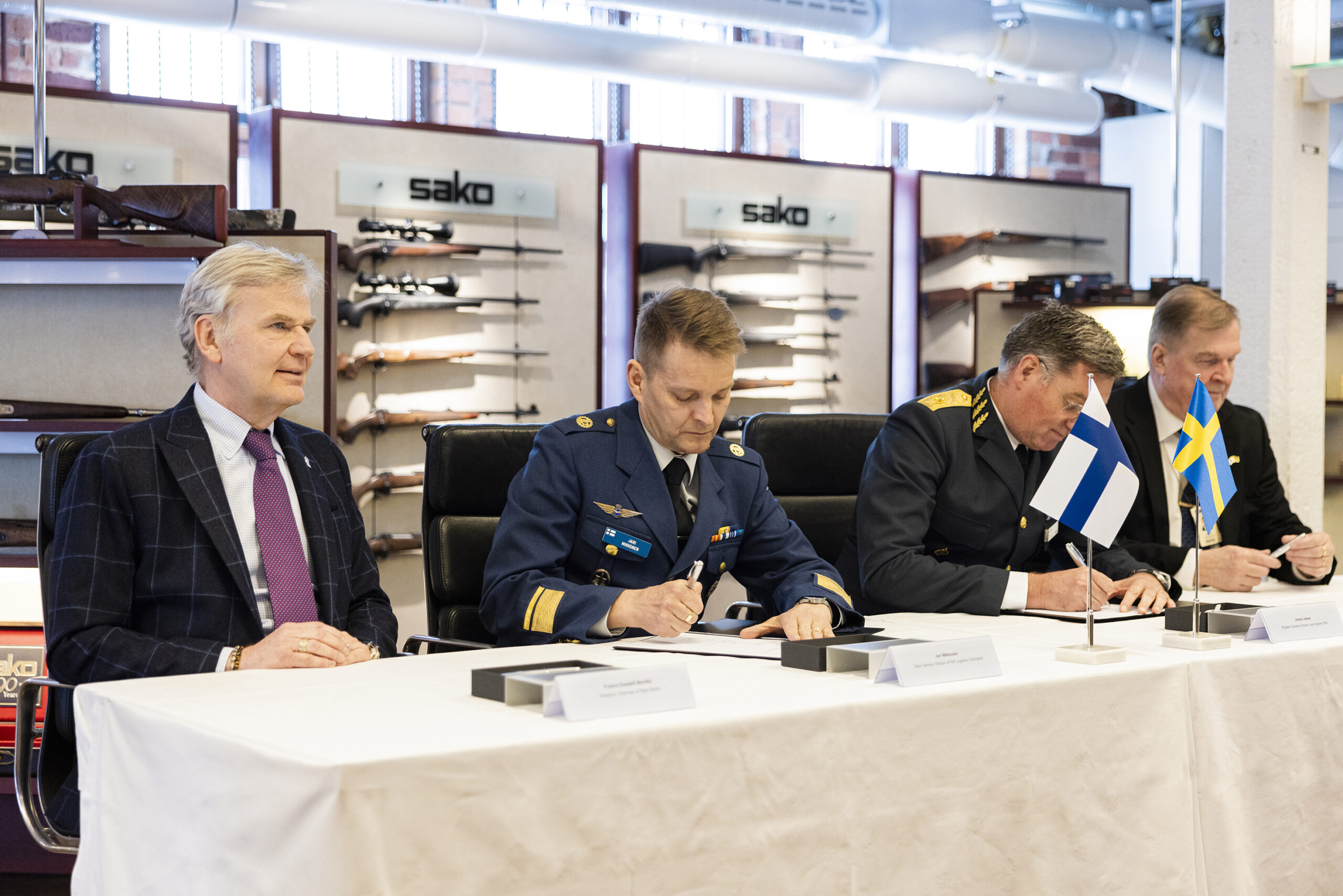 Sweden and Finland defense officials sign long-term arms deals with Sako.