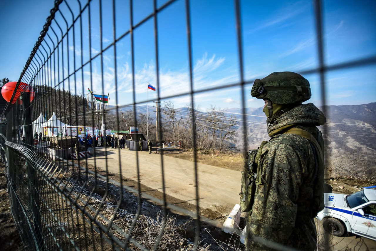 A Russian peacekeeper guarding the Lachin corridor