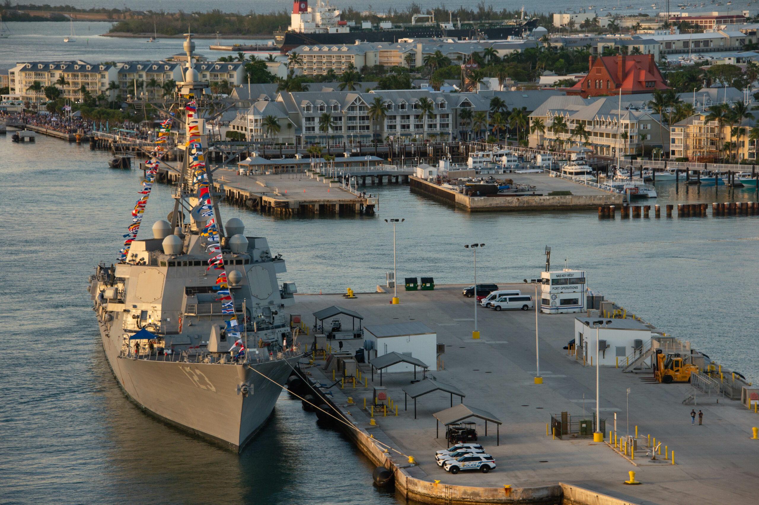 230508-N-IW125-1003 KEY WEST, Fla. (May 8, 2023) - The Navy’s newest Arleigh Burke-class guided-missile destroyer, USS Lenah Sutcliffe Higbee (DDG 123) sits at Naval Air Station Key West’s Truman Harbor ahead of her commissioning ceremony in Key West, Florida. DDG 123 is the second U.S. Navy warship to honor Lenah Sutcliffe Higbee. Higbee was the first woman to receive the Navy Cross for her leadership of the Navy Nurse Corps during World War I. Naval Air Station Key West is the state-of-the-art facility for combat fighter aircraft of all military services, provides world-class pierside support to U.S. and foreign naval vessels, and is the premier training center for surface and subsurface military operations. (U.S. Navy photo by MC2 Nicholas V. Huynh/Released)