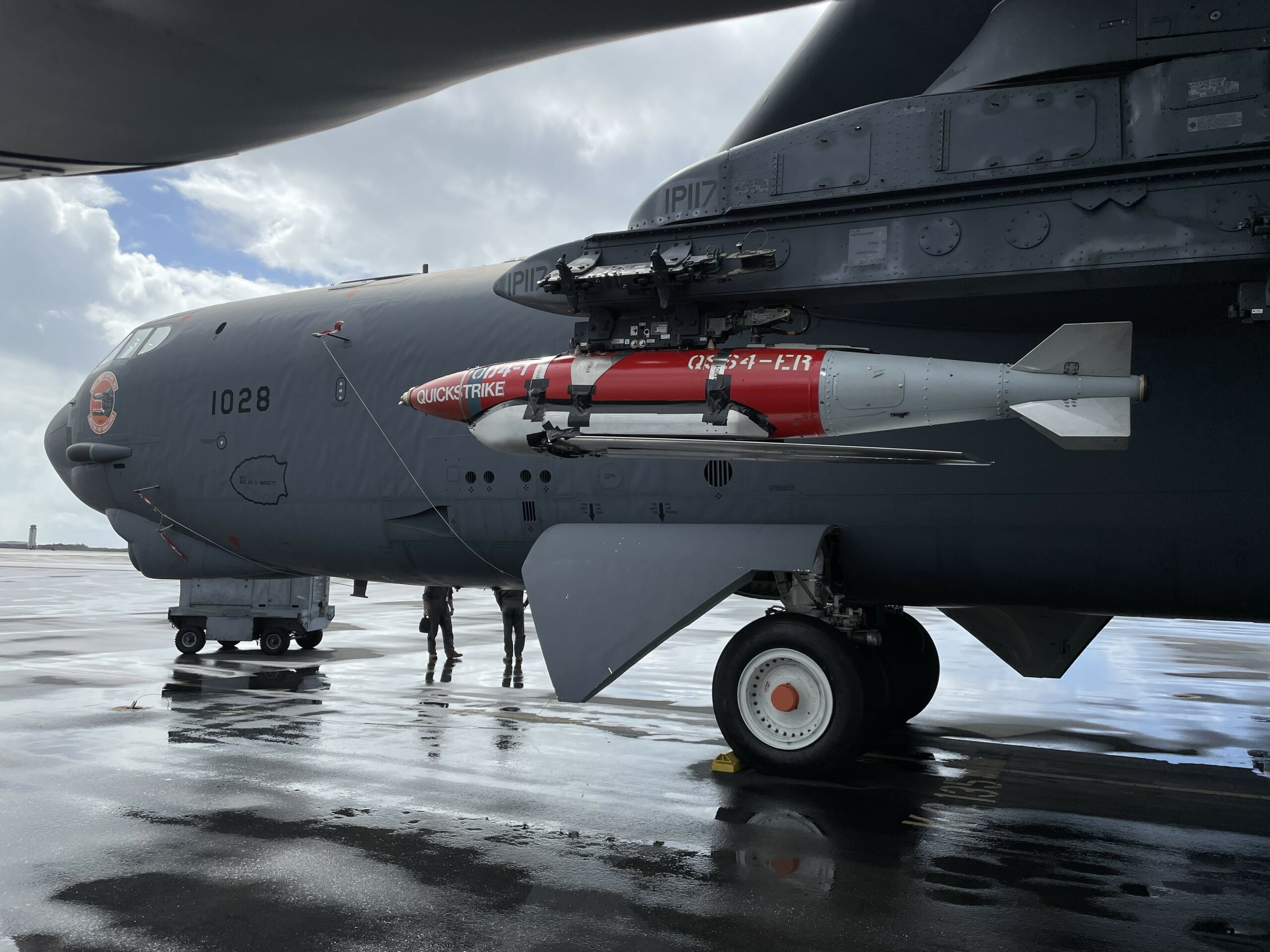 An inert Joint Direct Attack Munition QuickStrike Extended Range mine is attached to a US Air Force B-52H Stratofortress assigned to the 49th Test and Evaluation Squadron, Barksdale Air Force Base, in early March, 2023