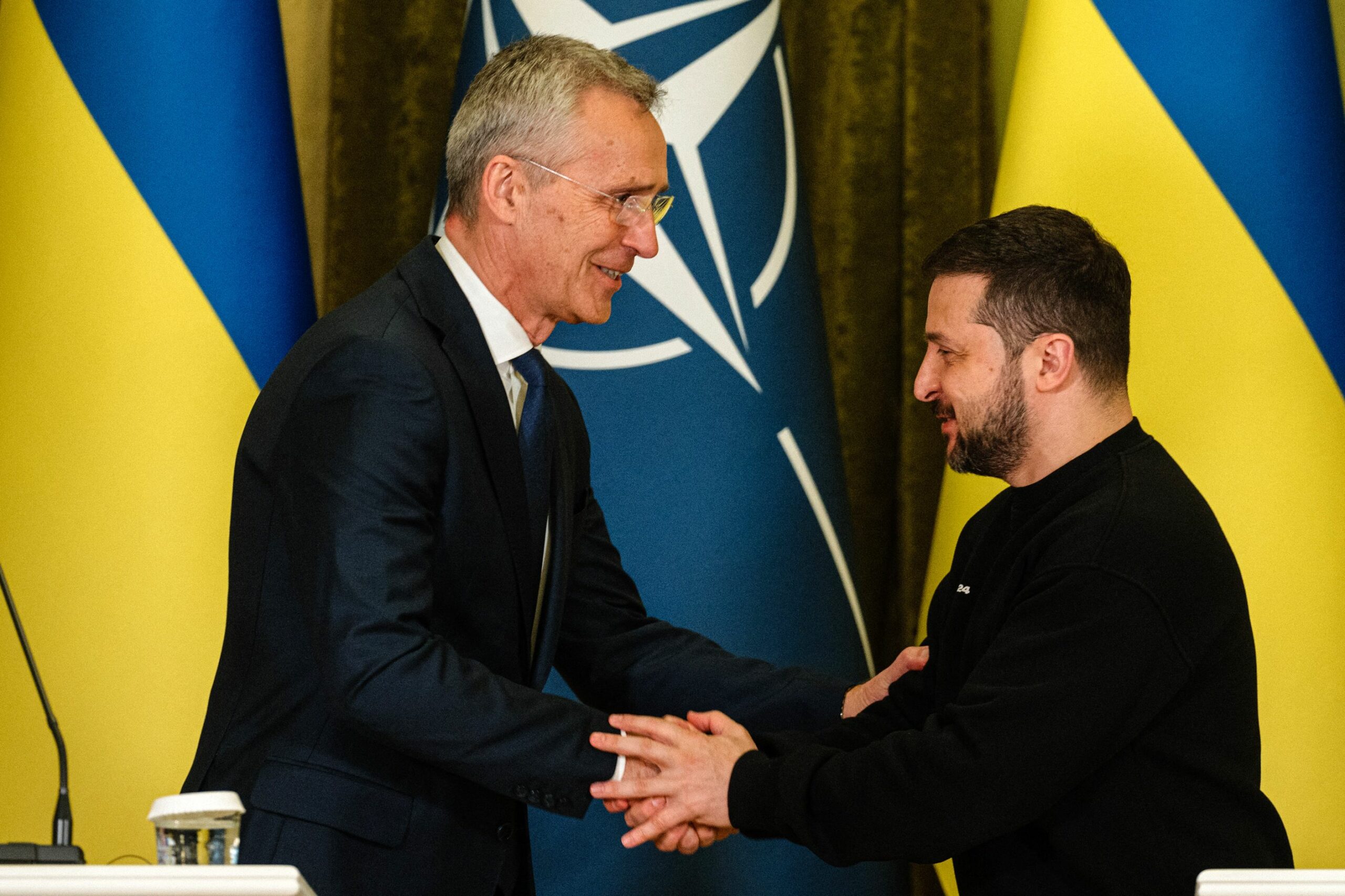 NATO head Jens Stoltenberg shakes hands with Ukrainian President Volodymyr Zelensky at the end of a joint press conference in Kyiv, on April 20, 2023, amid the Russian invasion of Ukraine