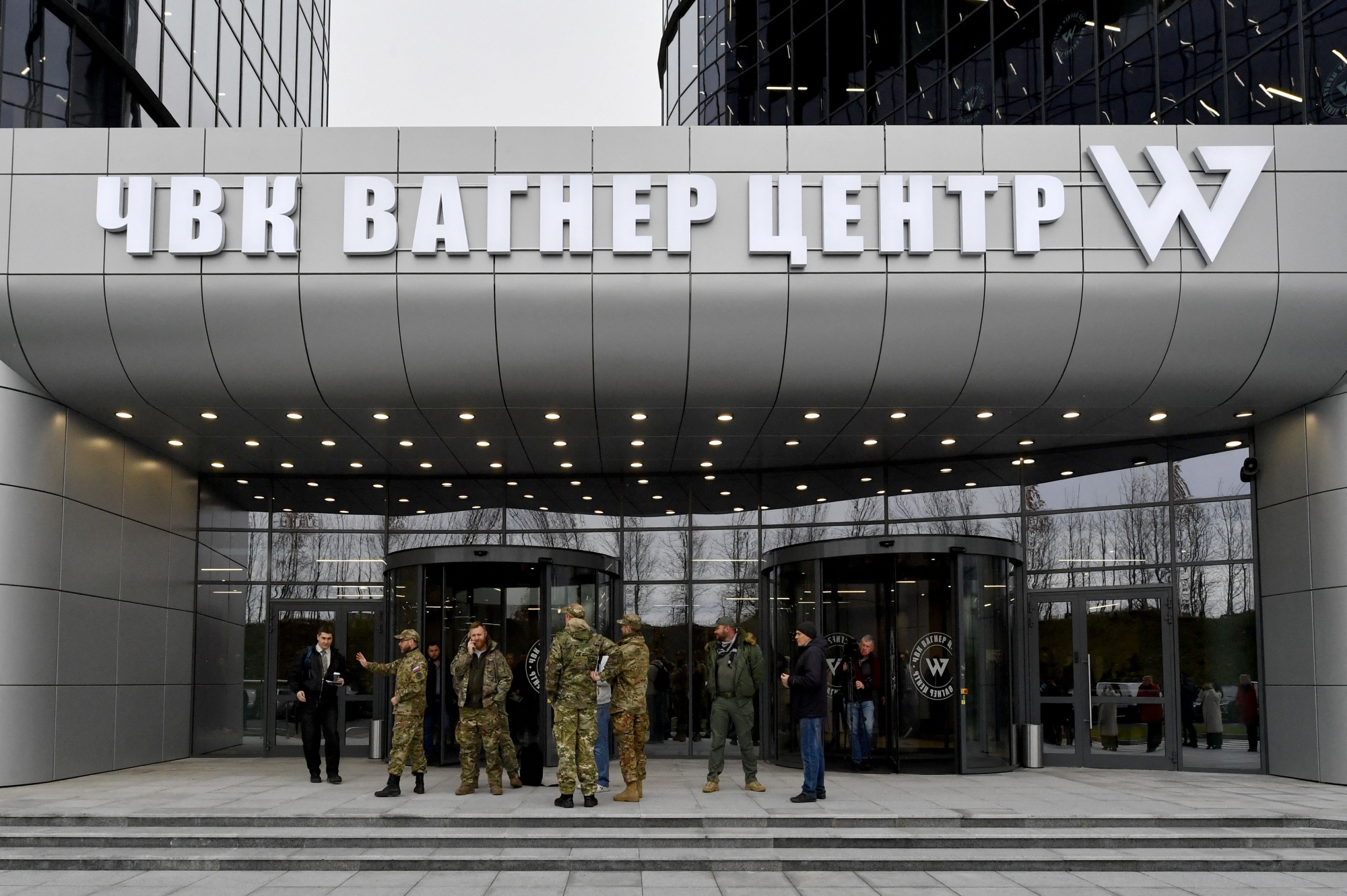 Visitors at the entrance of the PMC Wagner Centre in Saint Petersburg