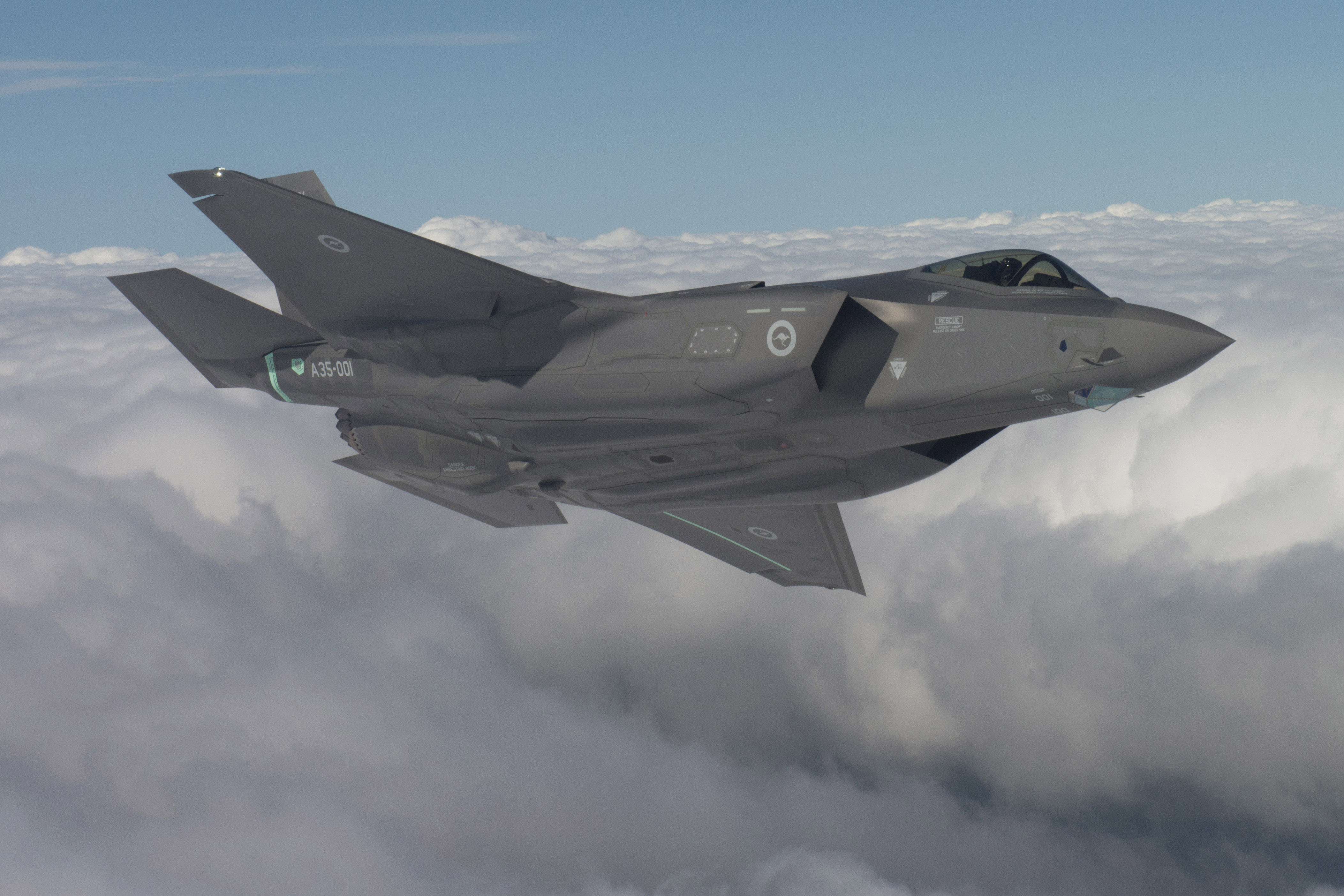 AU-1 First Flight at Fort Worth, Texas. Pilot Al Norman, the F-35 Chief Test Pilot, flying Australia's first F-35. *** Local Caption *** FORT WORTH, Texas, September 30, 2014  Australias first Lockheed Martin, F-35A Lightning II Joint Strike Fighter, made its inaugural flight on Sept. 29, marking another significant milestone for the Royal Australian Air Forces F-35 program. Lockheed Martin F-35 Chief Test Pilot Alan Norman, piloted the aircraft through a series of functional checks for the sortie that lasted two hours. The aircraft, known as AU-1, is scheduled for delivery to the Royal Australian Air Force later this year and will be assigned to Luke Air Force Base, Arizona. Australia and partner countries will use the jet for F-35A pilot training. The F-35 Lightning II aircraft provides the Royal Australian Air Force with a transformational 5th generation fighter capability and significant benefits for the Australian aerospace industry. Australian industry already has more than $412 million (USD) contracted.