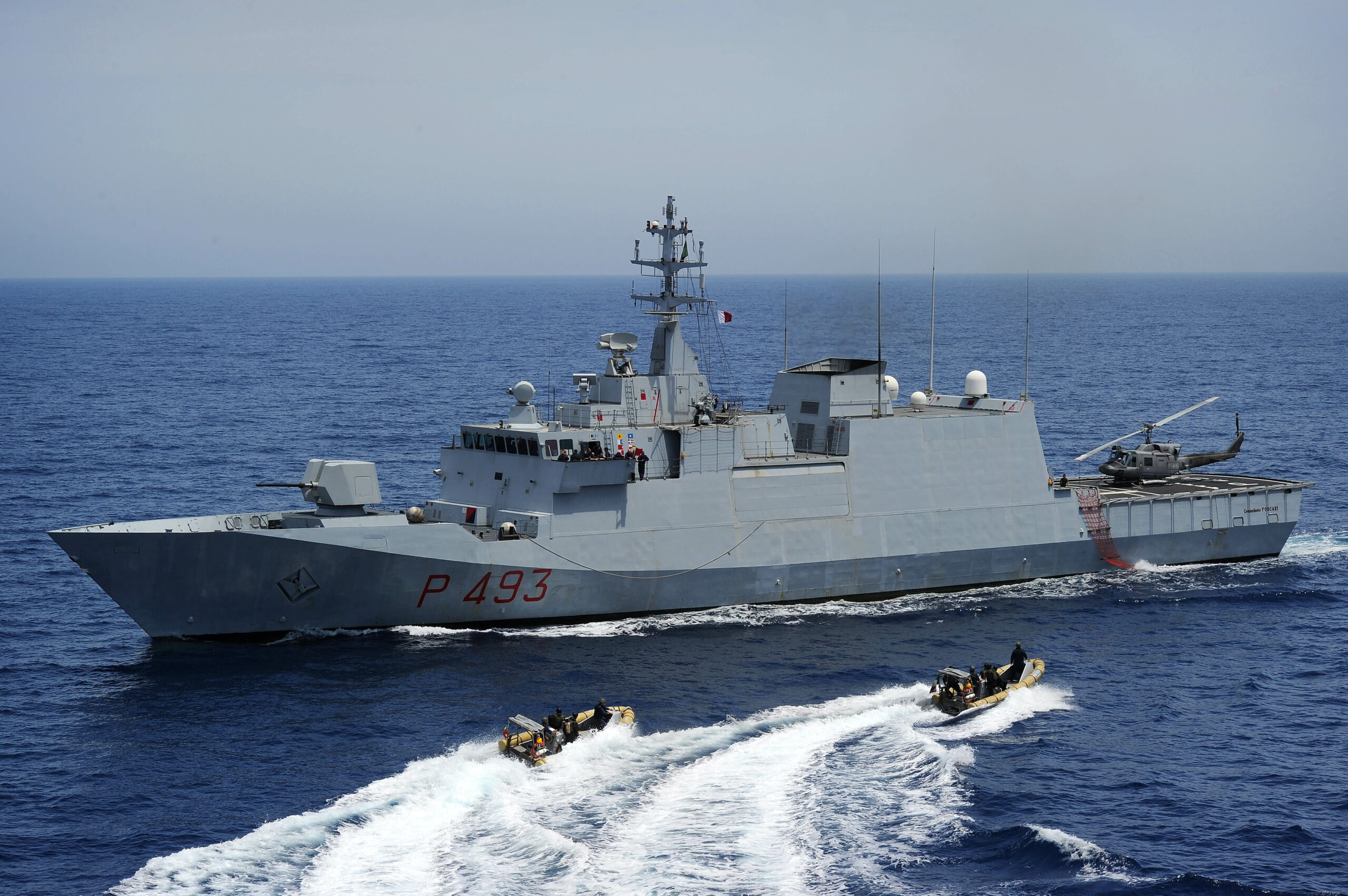 An Italian Navy visit, board, search and seizure team returns to the Italian Navy offshore patrol vessel ITS Comandante Foscari after completing inspections aboard the Military Sealift Command container and roll-on/roll-off ship USNS LCPL Roy H. Wheat during the at sea portion of exercise Phoenix Express 2010. PE-10 is a two-week exercise designed to strengthen maritime partnership and enhance stability in the region through increased interoperability and cooperation among partners from Africa, Europe and United States.
