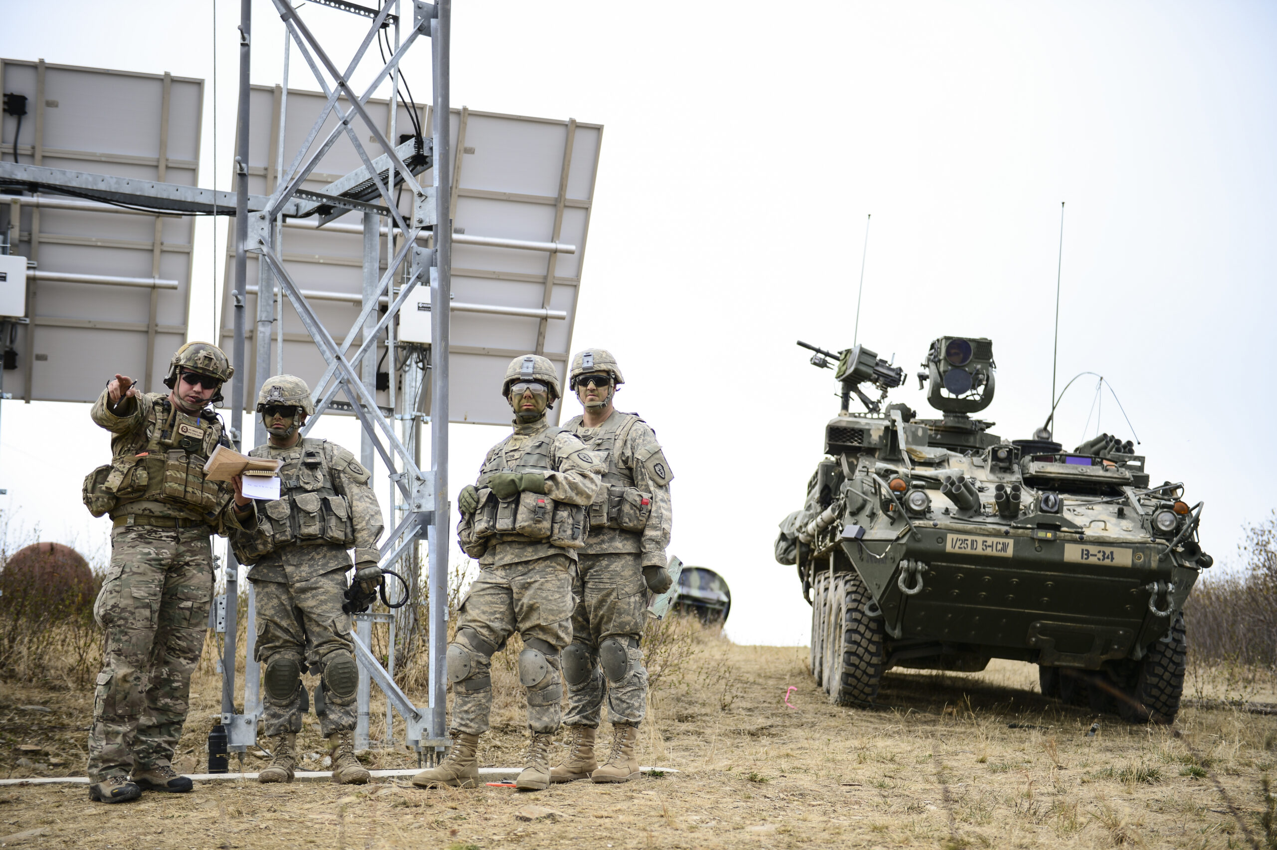 A U.S. Air Force joint terminal attack controller and U.S. Army joint forward observers identify targets and plan attacks during Red Flag-Alaska 14-1 May 15, 2014, Joint Pacific Alaska Range Complex, Alaska. Air Force JTAC members supported Army ground commanders in neutralizing priority targets and mitigating ground-to-air threats for U.S. Air Force A-10 Thunderbolt II's in simulated enemy air space. (U.S. Air Force photo by Senior Airman Peter Reft/Released)