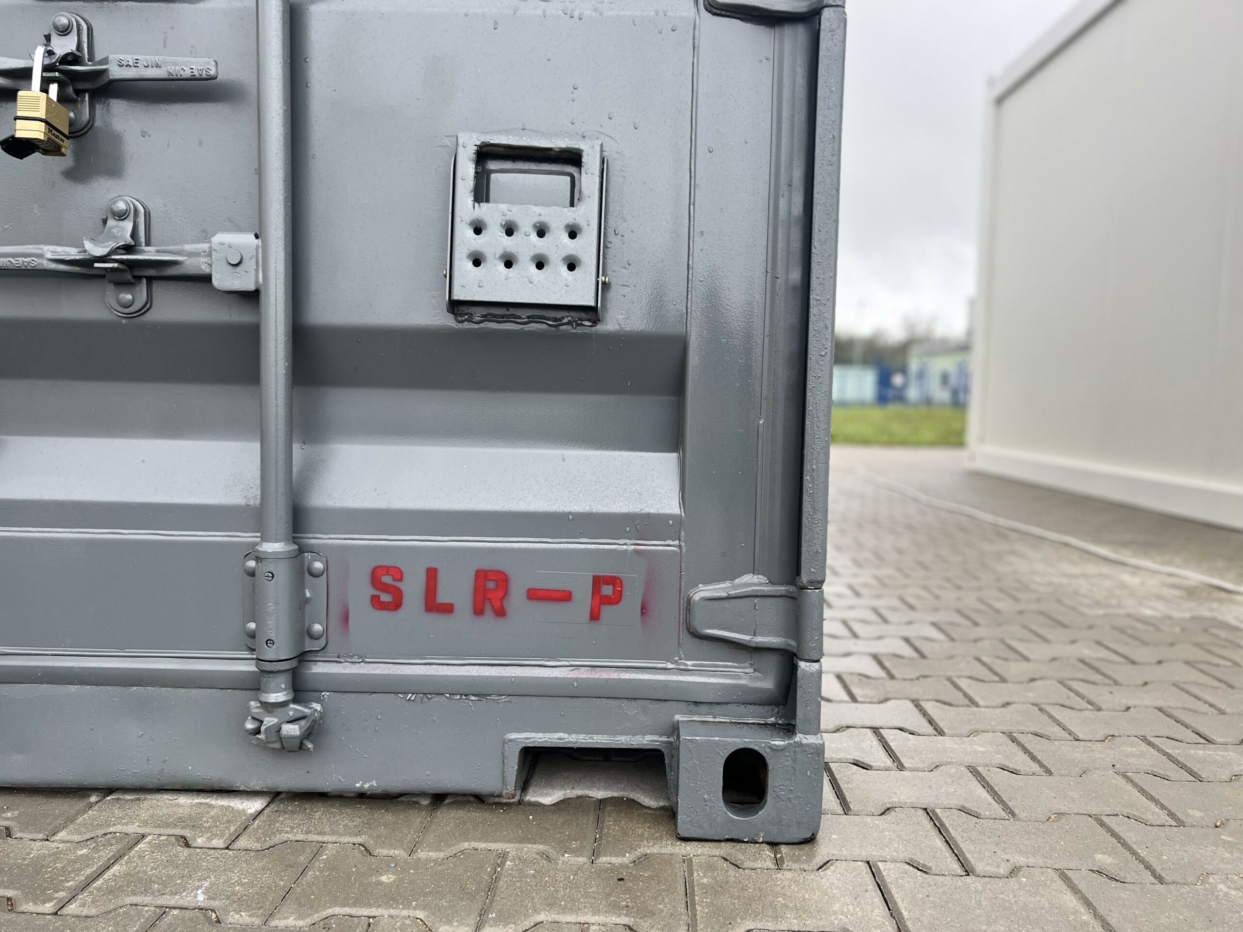 A mobile container from U.S. Air Forces in Europe and Air Forces Africa’s 435th Contingency Response sits ready as a part of the Satellite Launch and Recover Package for a proof of concept on the MQ-9A Reaper in Mirosławiec, Poland, Aug. 30, 2023. Tailored specifically for the European and African theaters, the SLR-P consists of a small container that can be retrofitted with its own wheels to be towed or be carried by any means of available transportation. (U.S. Air Force photo by 2nd Lt Gabriele Gocso)
