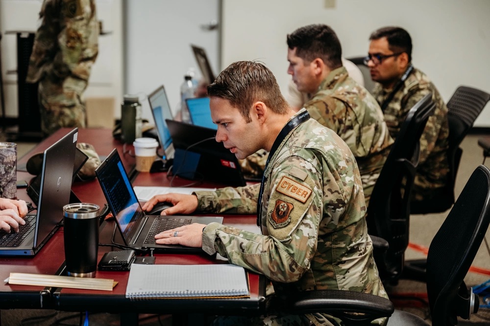 Members of the Oklahoma National Guard cybersecurity team work together to defend networks during Cyber Shield 2023