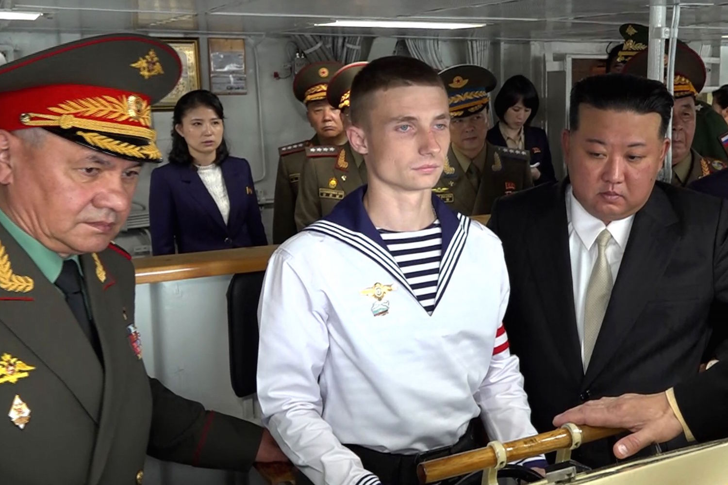 In this video grab taken from a handout footage released on September 16, 2023 by Russian Defence Ministry, North Korea's leader Kim Jong Un and Russia's Defence Minister Sergei Shoigu visit the Marshal Shaposhnikov frigate of the Russian Pacific Fleet in Vladivostok