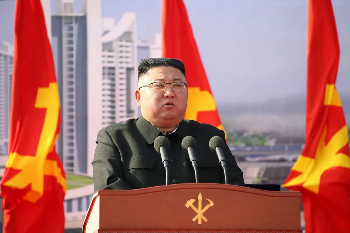 North Korean leader Kim Jong Un speaks during a ground-breaking ceremony in Pyongyang, 2021