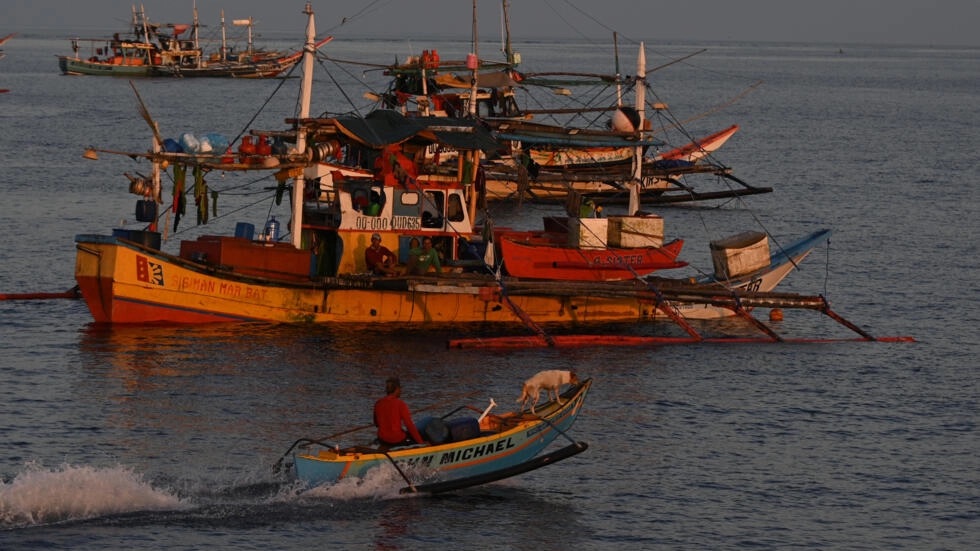 Filipino fishermen say that China's actions at Scarborough Shoal are robbing them of a key source of income