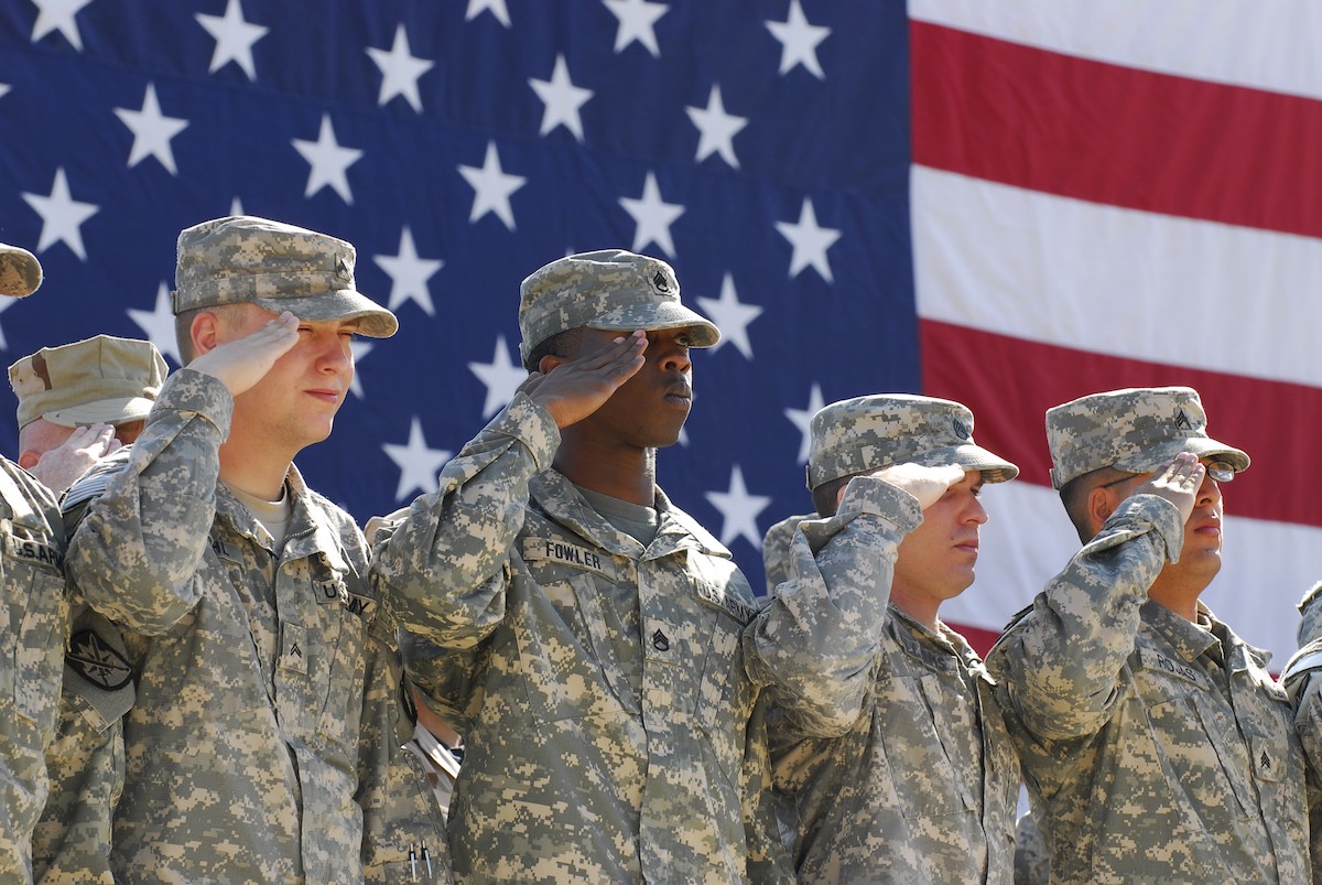 US Army soldiers honoring those that came before