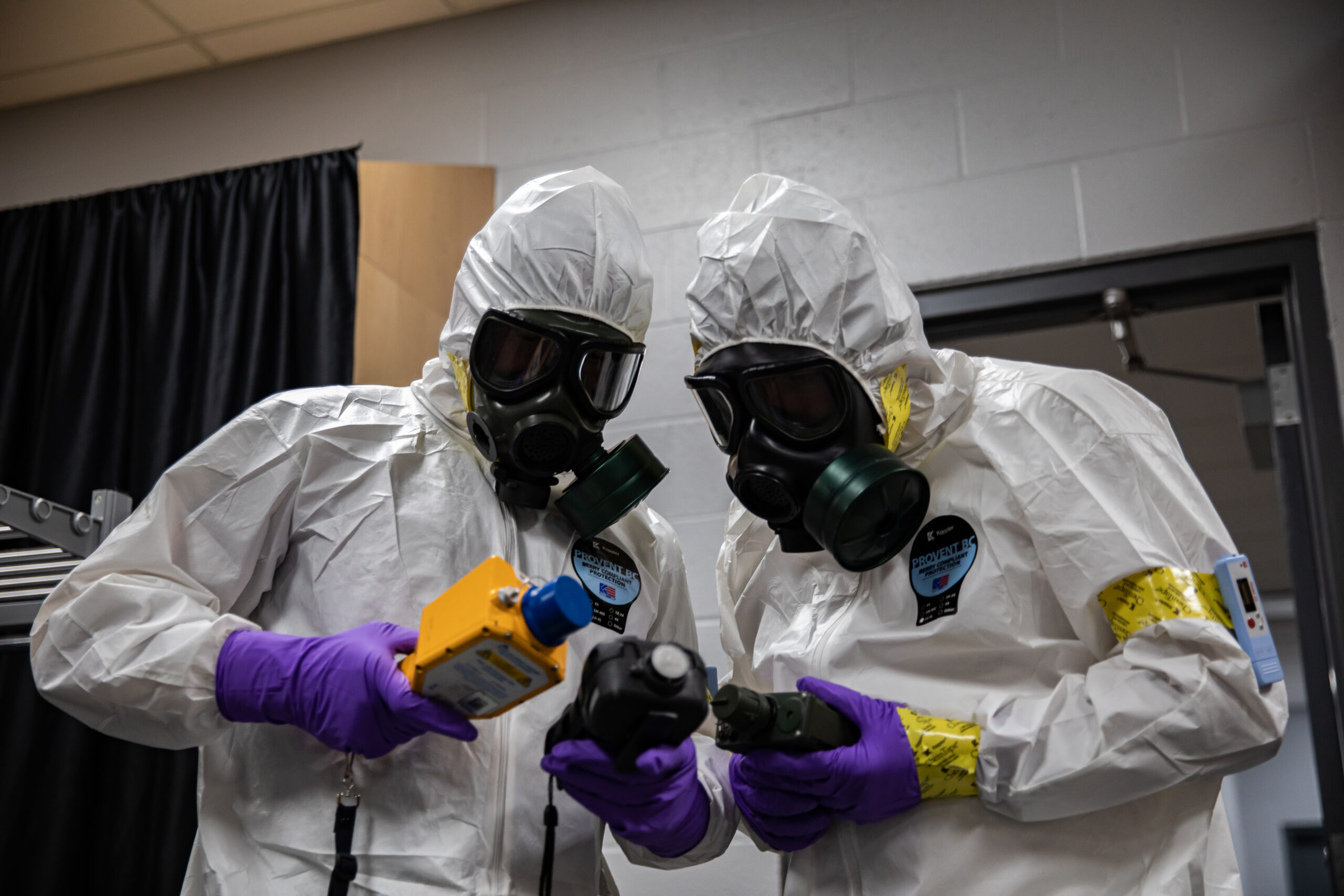 Members of the Kosovo Security Force Hazardous Materials Company discover clues that lead to a planted, homemade explosive device in a training scenario in Wells Fargo Arena in Des Moines, Iowa, Sept. 21, 2023. The KSF worked with the 71st Civil Support Team, Iowa National Guard for a week long opportunity to work alongside the Des Moines Fire Department to find hazardous materials. (U.S. Army National Guard photo by Sgt. Rachel I. White)