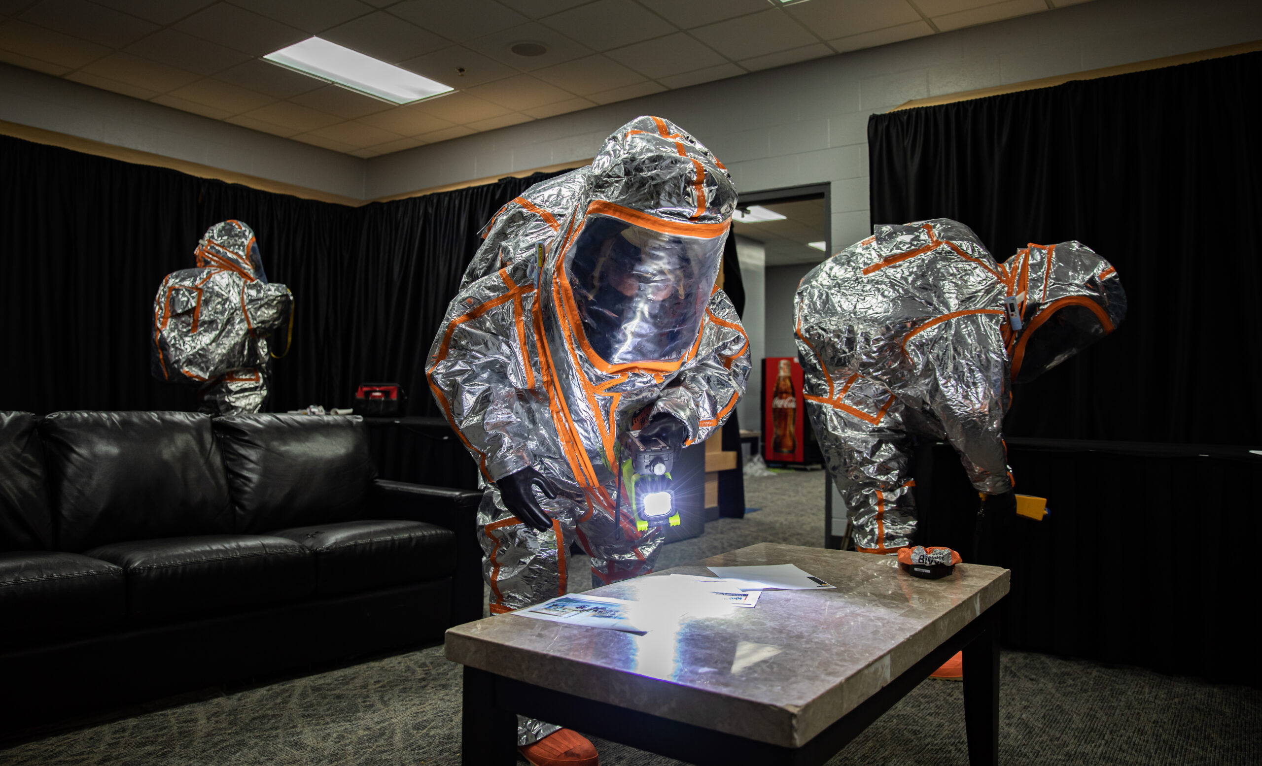 Members of the Kosovo Security Force Hazardous Materials Company discover clues that lead to a planted, homemade explosive device in a training scenario in Wells Fargo Arena in Des Moines, Iowa, Sept. 21, 2023. The KSF worked with the 71st Civil Support Team, Iowa National Guard for a week long opportunity to work alongside the Des Moines Fire Department to find hazardous materials. (U.S. Army National Guard photo by Sgt. Rachel I. White)