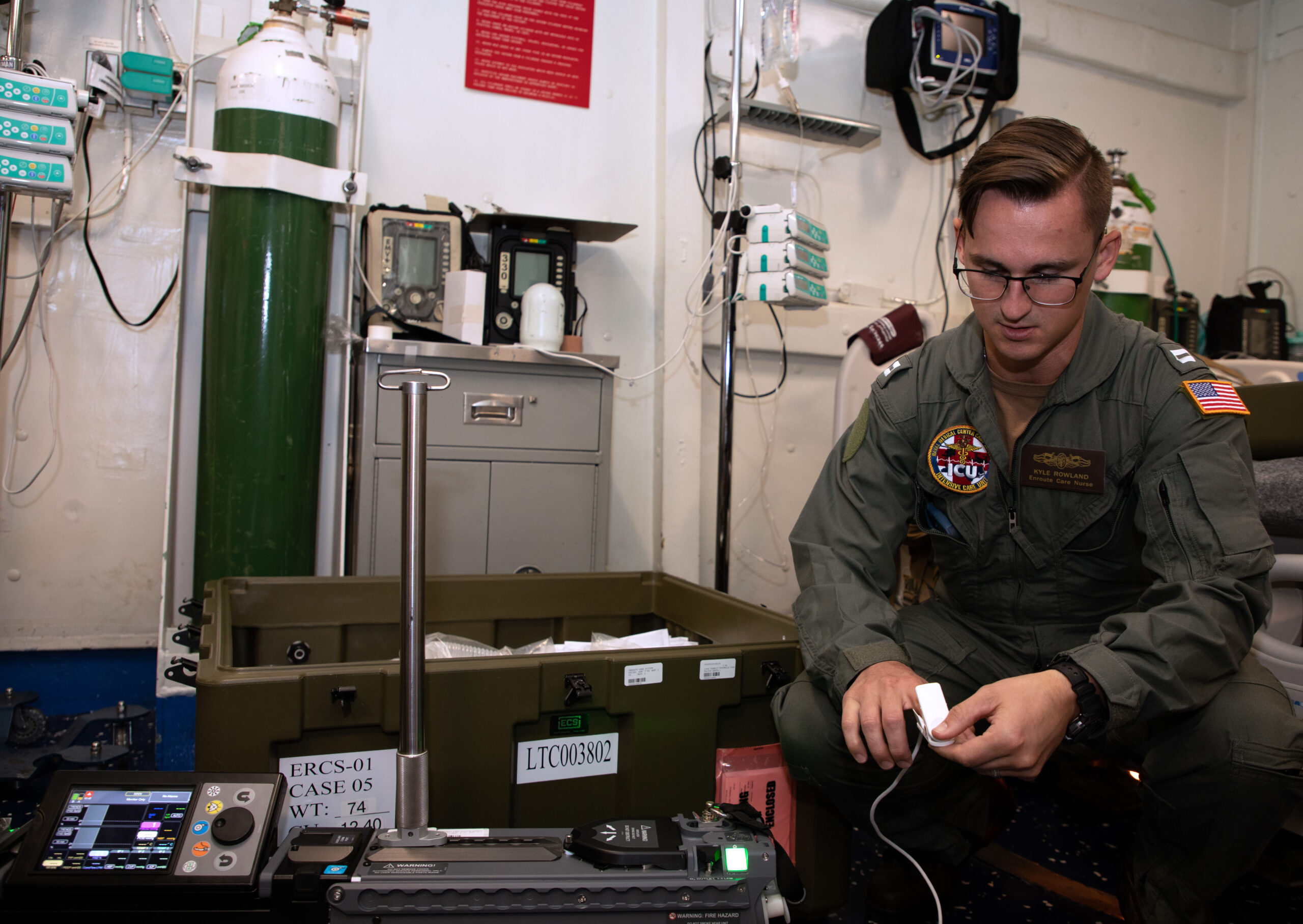 231011-N-MS174-1002 NORFOLK, Va. (Oct. 11, 2023) Lt. Kyle Rowland, a critical care nurse assigned to Navy Medicine Readiness and Training Command (NMRTC) Camp Lejeune, tests an integrated intensive care mobile unit during inventory in the medical department aboard Nimitz-class aircraft carrier USS Dwight D. Eisenhower (CVN 69). Rowland is a part of a 2-person team with the En-Route Care System (ERCS), one of the Navy’s newest medical capabilities that will deploy for the first time with the Eisenhower Carrier Strike Group to meet the demands of maritime operations in a distributed environment. (U.S. Navy photo by Bobbie A. Camp)