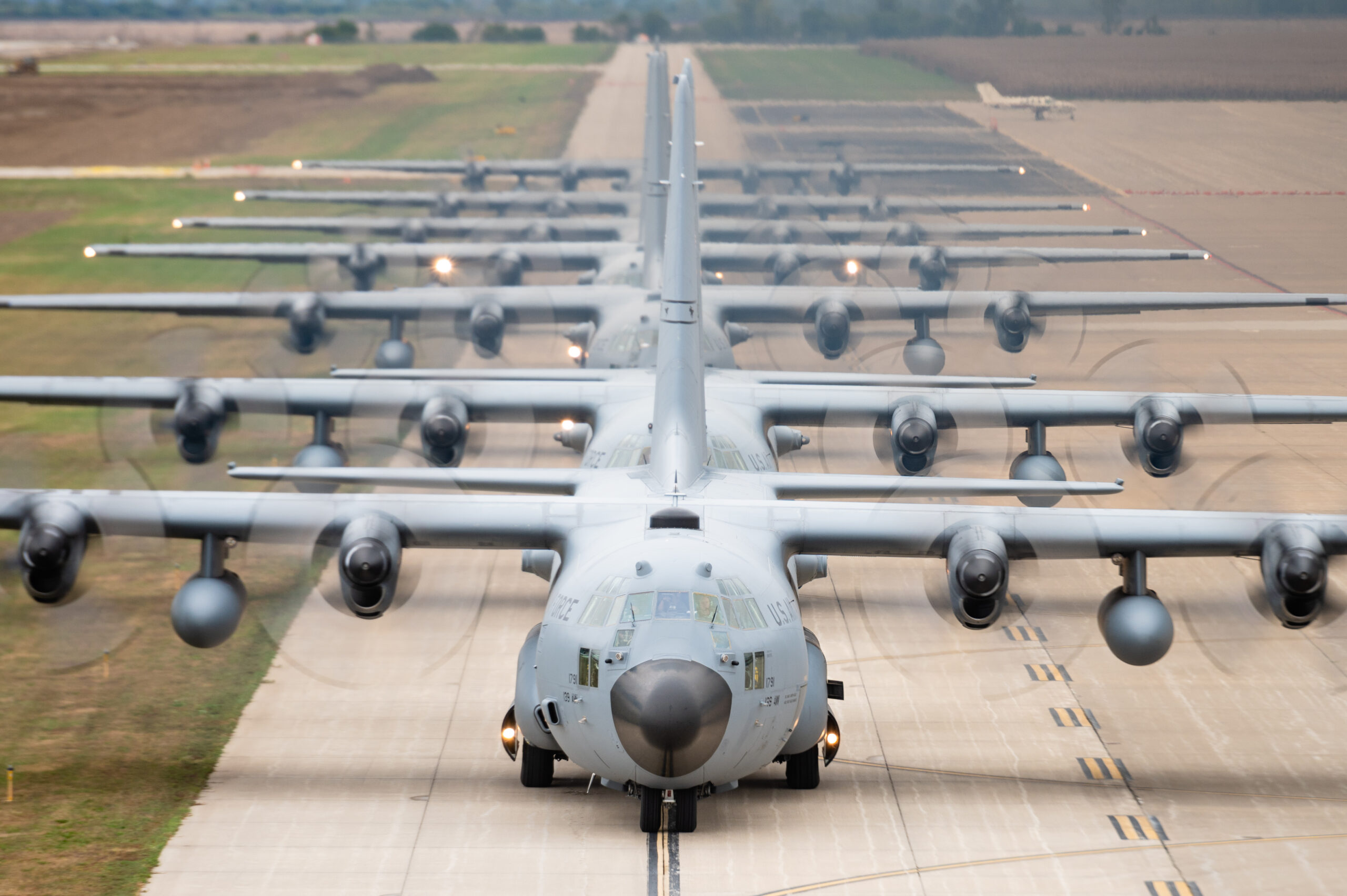 Maintenance and aircrew Airmen assigned to the 139th Airlift Wing, Missouri Air National Guard, conducted a mass generation of seven C-130 Hercules aircraft at Rosecrans Air National Guard base, St. Joseph, Missouri, October 14, 2023. Some of the aircraft conducted airdrops at Rosecrans and some aircraft conducted a flyover at a Missouri Western State University football game. (U.S. Air National Guard photo by Senior Master Sgt. Michael Crane)